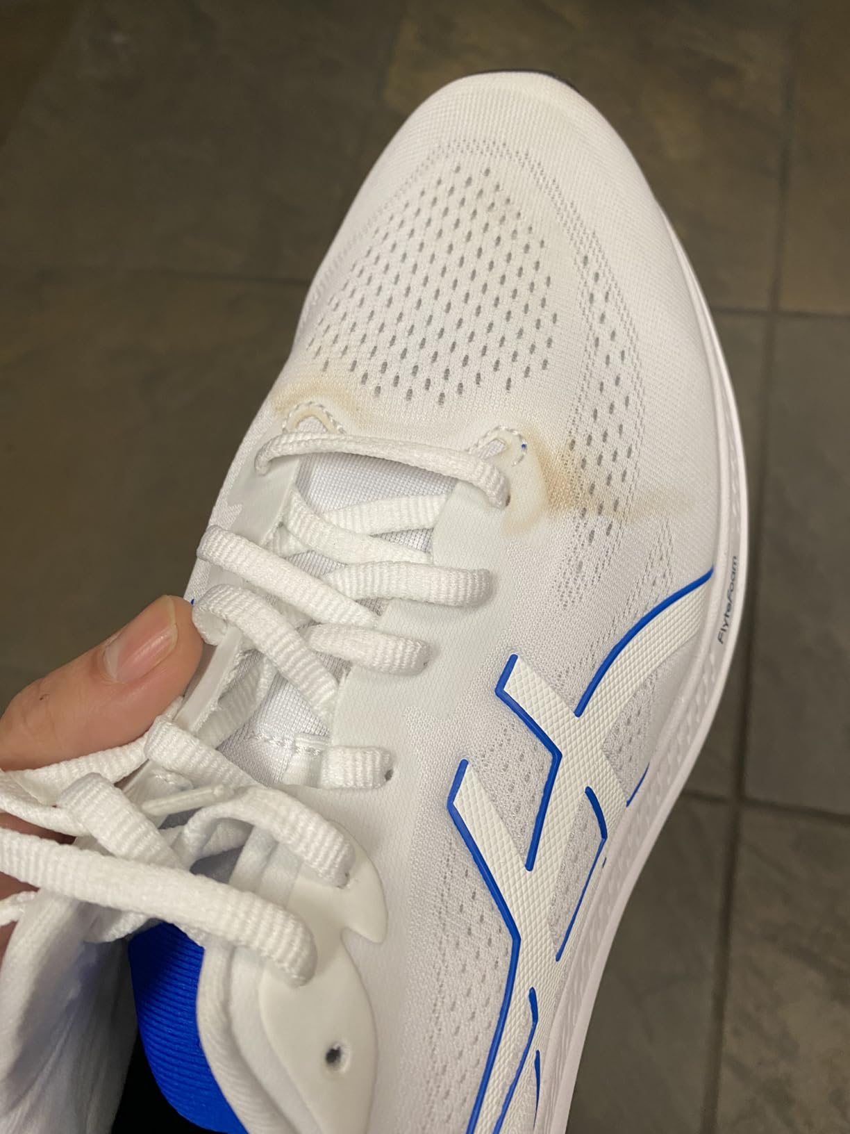 ASICS GT-1000 12 showing LITETRUSS technology and midsole construction