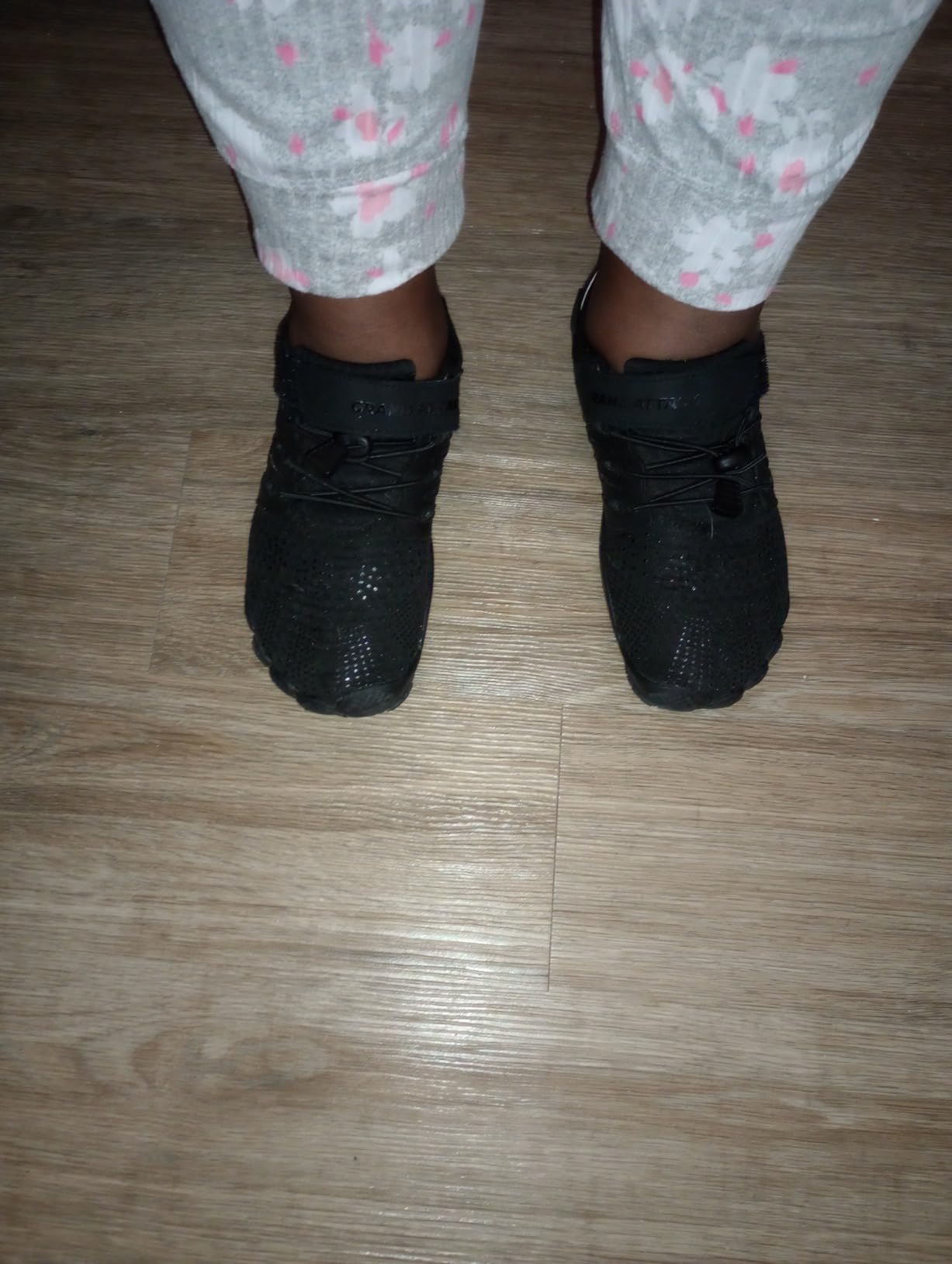 Grand Attack barefoot shoes on feet showing natural toe spread and ground contact