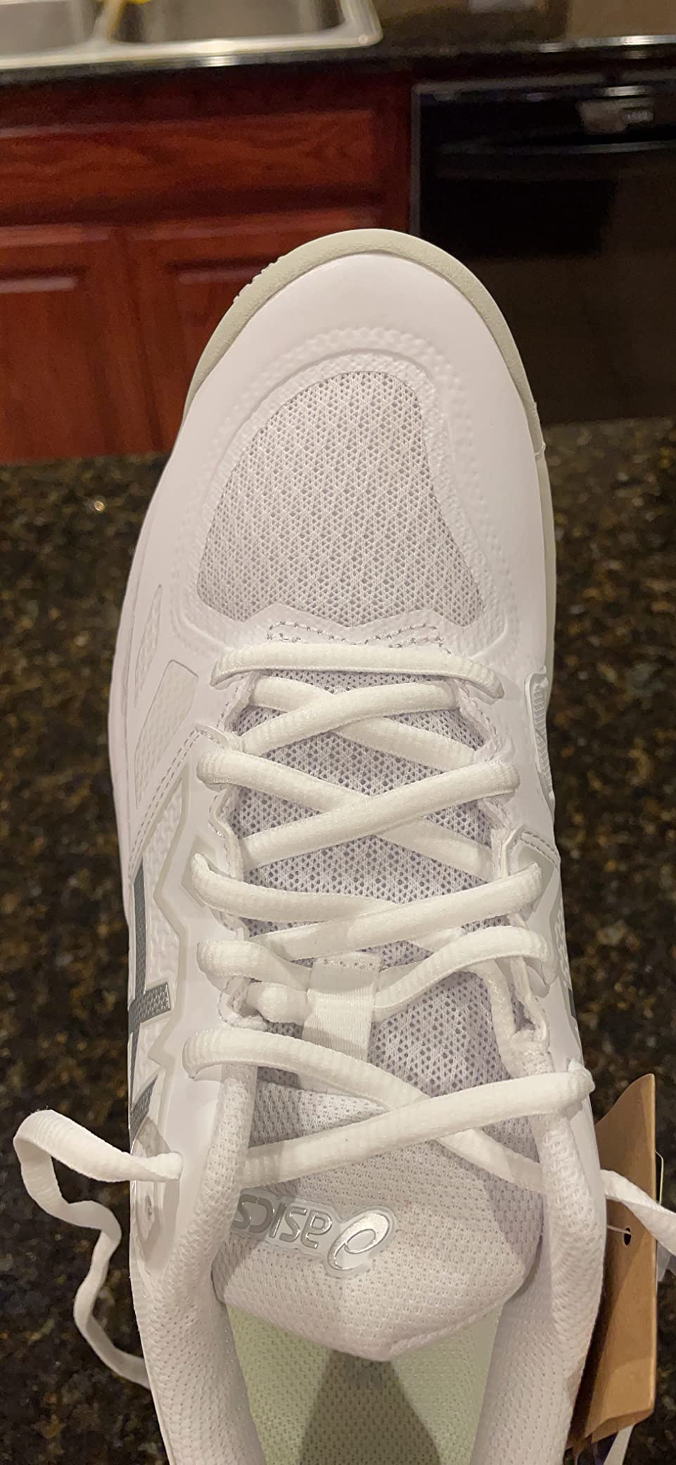 Asics Gel-Challenger 13 side profile showing WINGWALL technology and overall design aesthetic