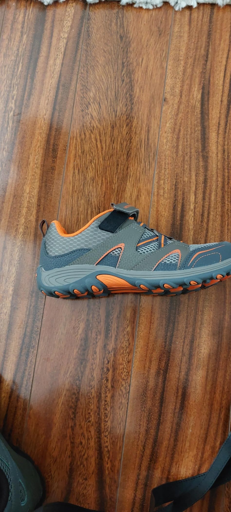 Velcro strap issue on Merrell Trail Chaser showing hook part sticking out causing problems