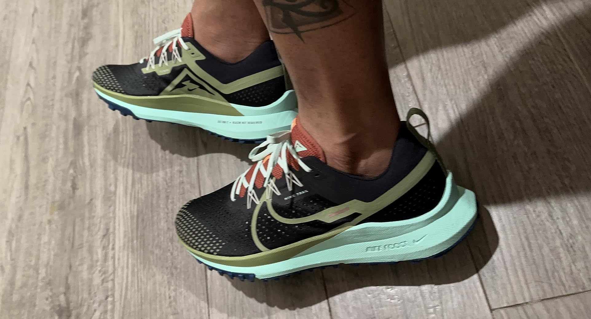 Nike trail shoe outsole showing aggressive tread pattern for trail traction