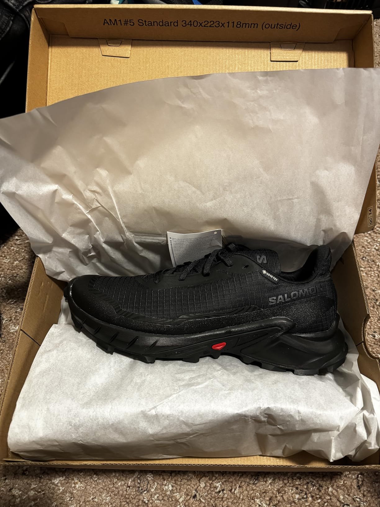 Salomon Alphacross 5 Gore-Tex on foot showing fit and comfort during trail testing
