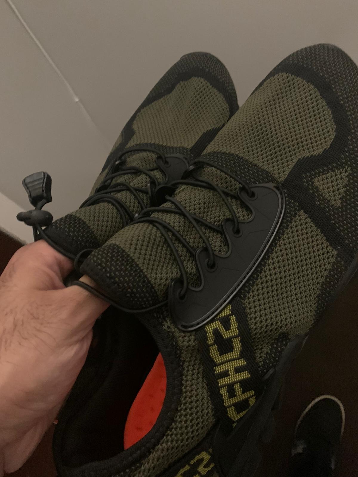 ABAO hiking shoes black colorway showing knitted mesh upper and rubber outsole design