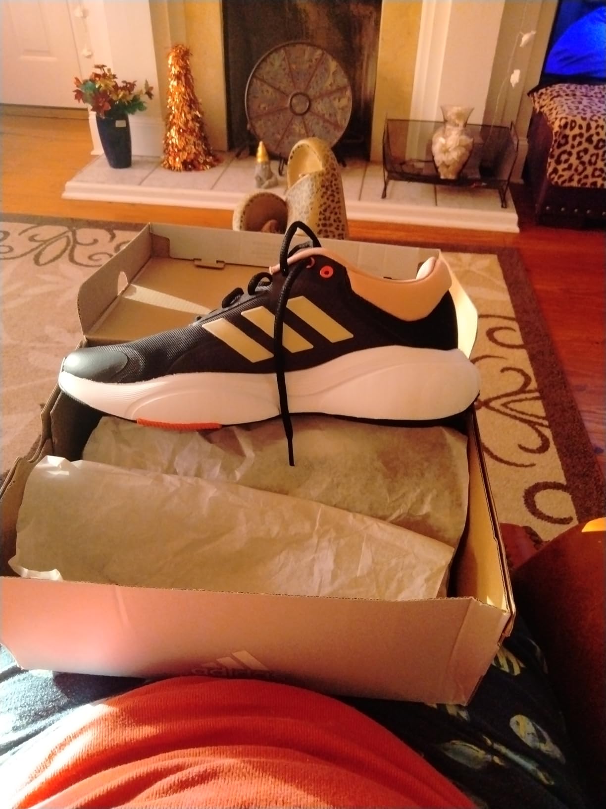 Action shot of Adidas Women's Response shoes during outdoor running on pavement