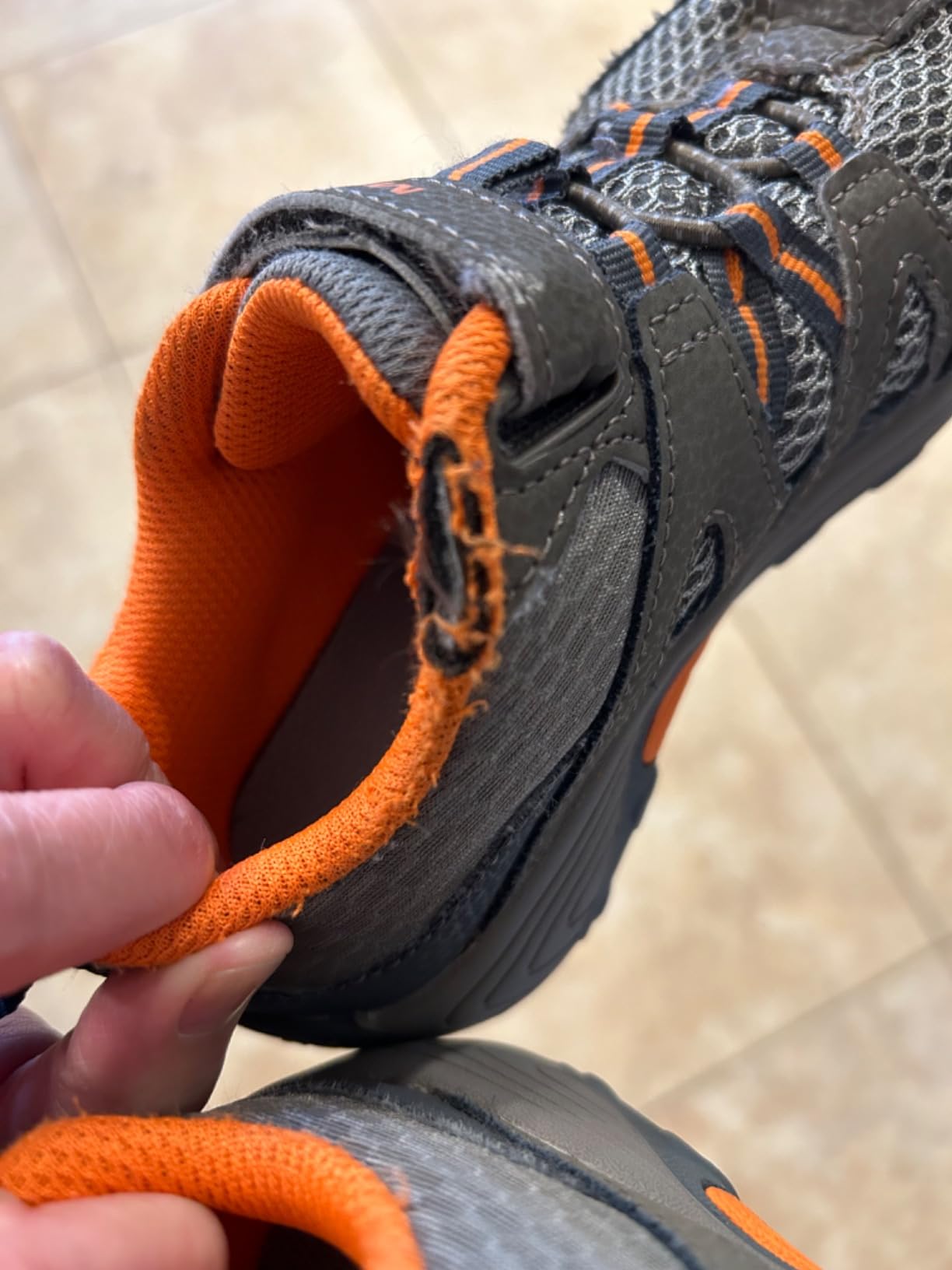 Fabric fraying along liner of Merrell Trail Chaser after one month of school wear