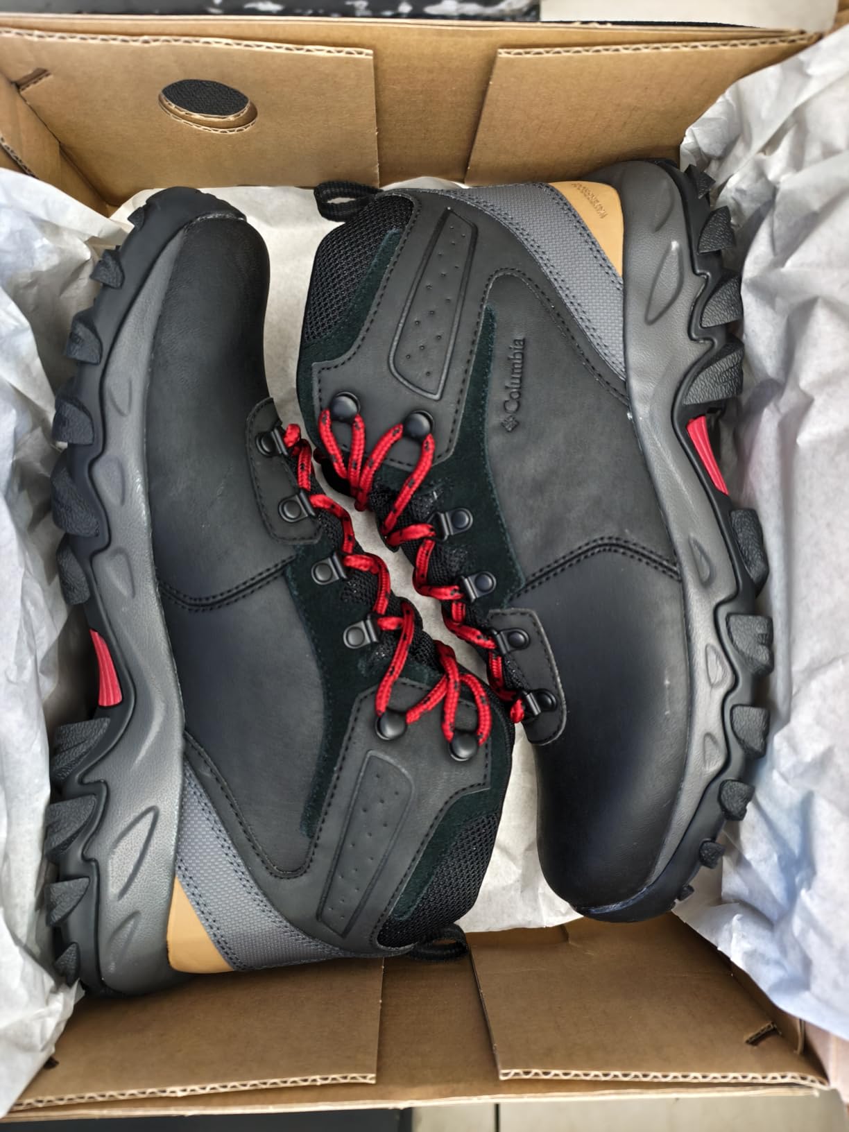 Well-worn Columbia hiking boots showing durability after extended use