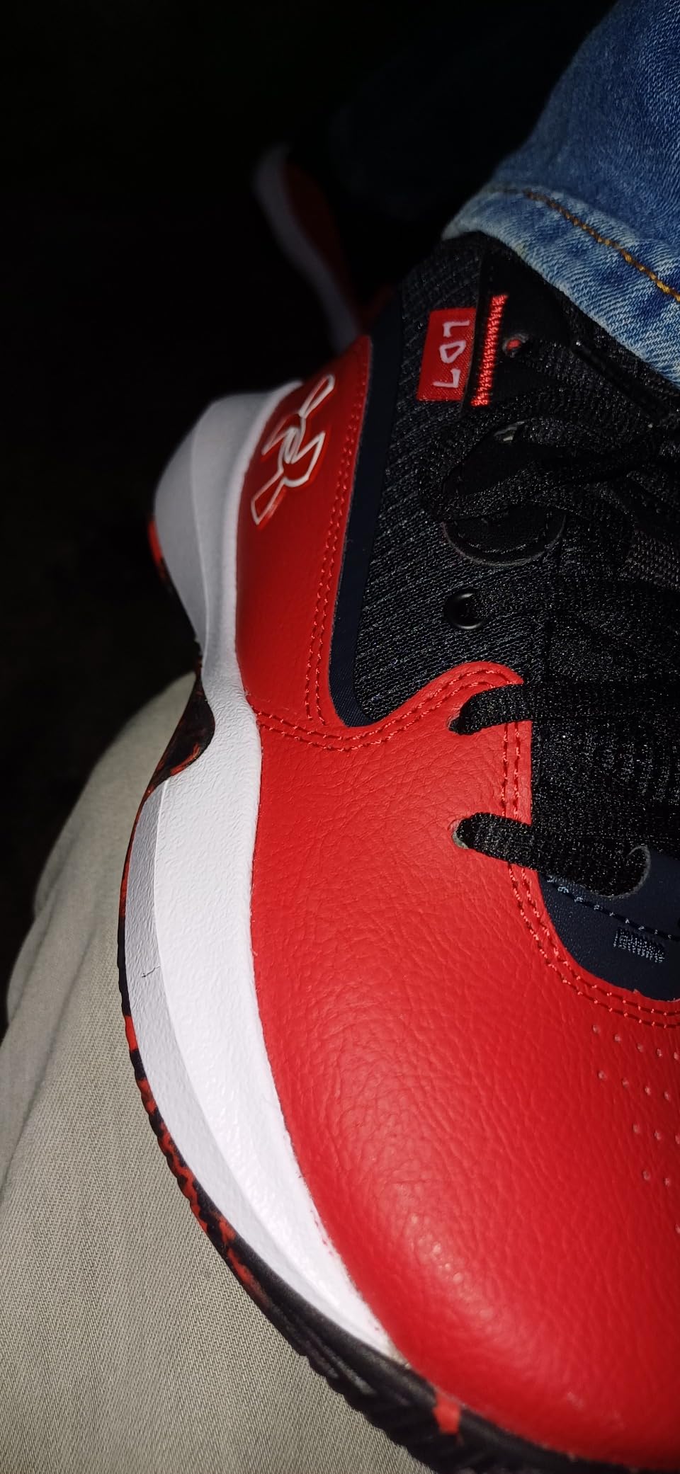 Under Armour Lockdown 7 basketball shoes in different lighting showing color detail and build quality