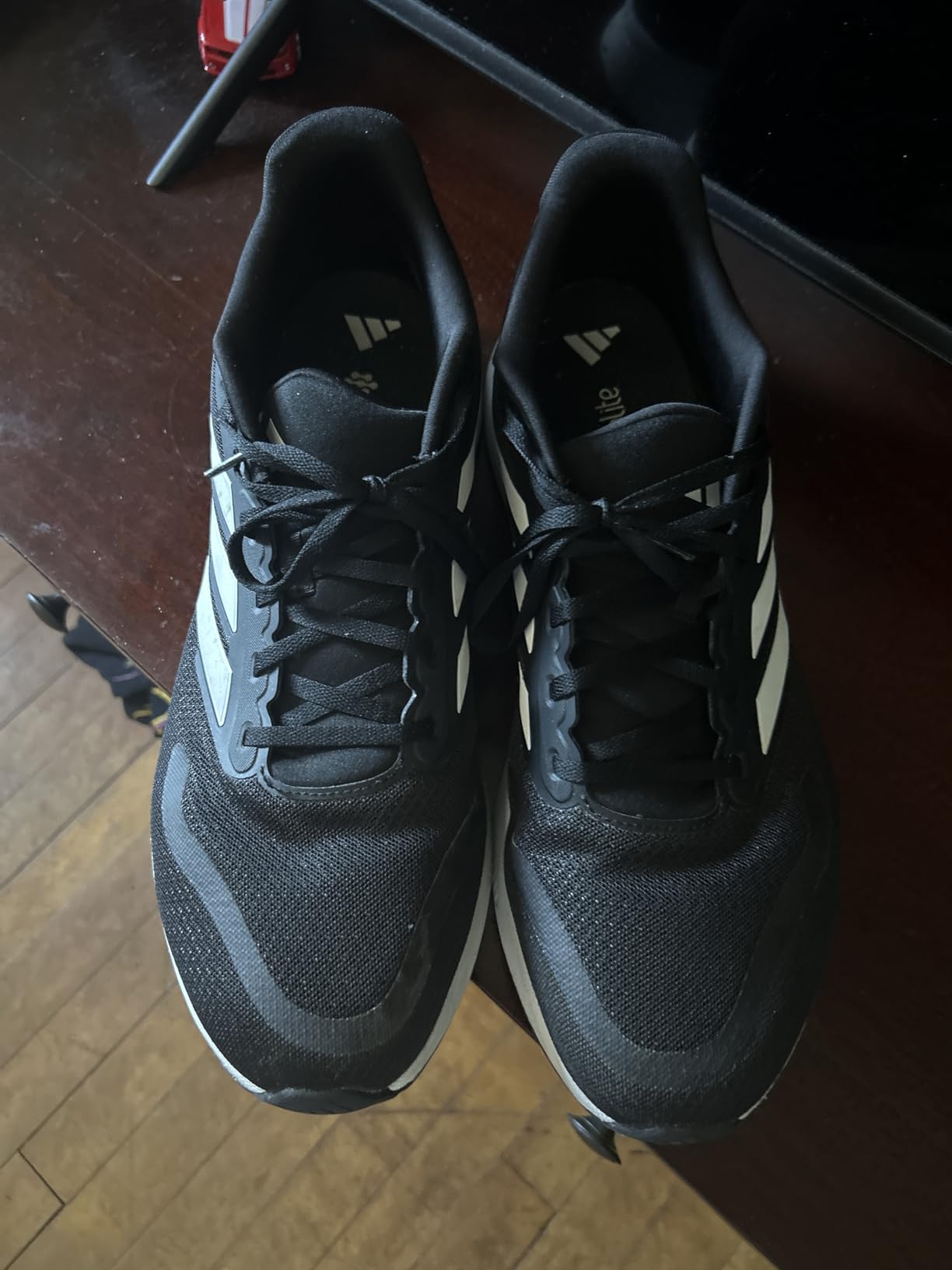 Adidas Run Falcon 5 side profile showing mesh upper construction and Cloudfoam midsole