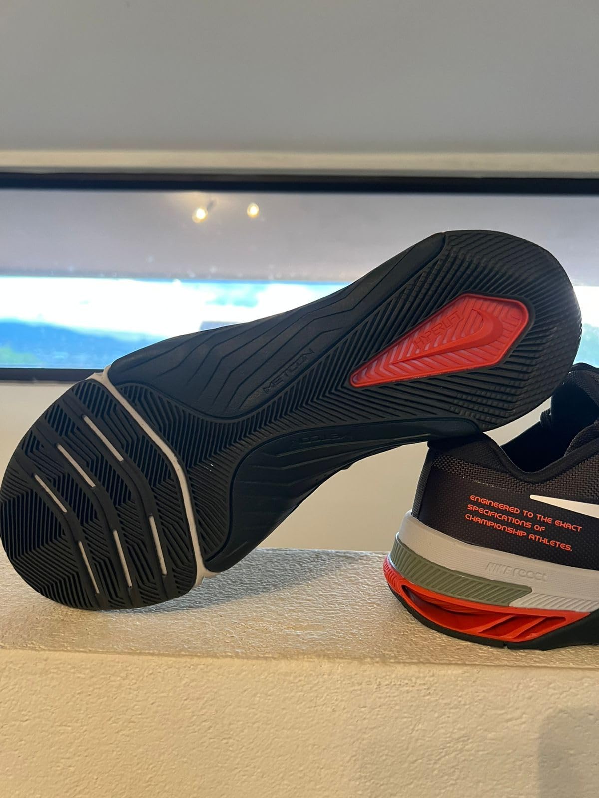 Nike Metcon 8 side profile showing mesh upper construction and distinctive rubber sole pattern