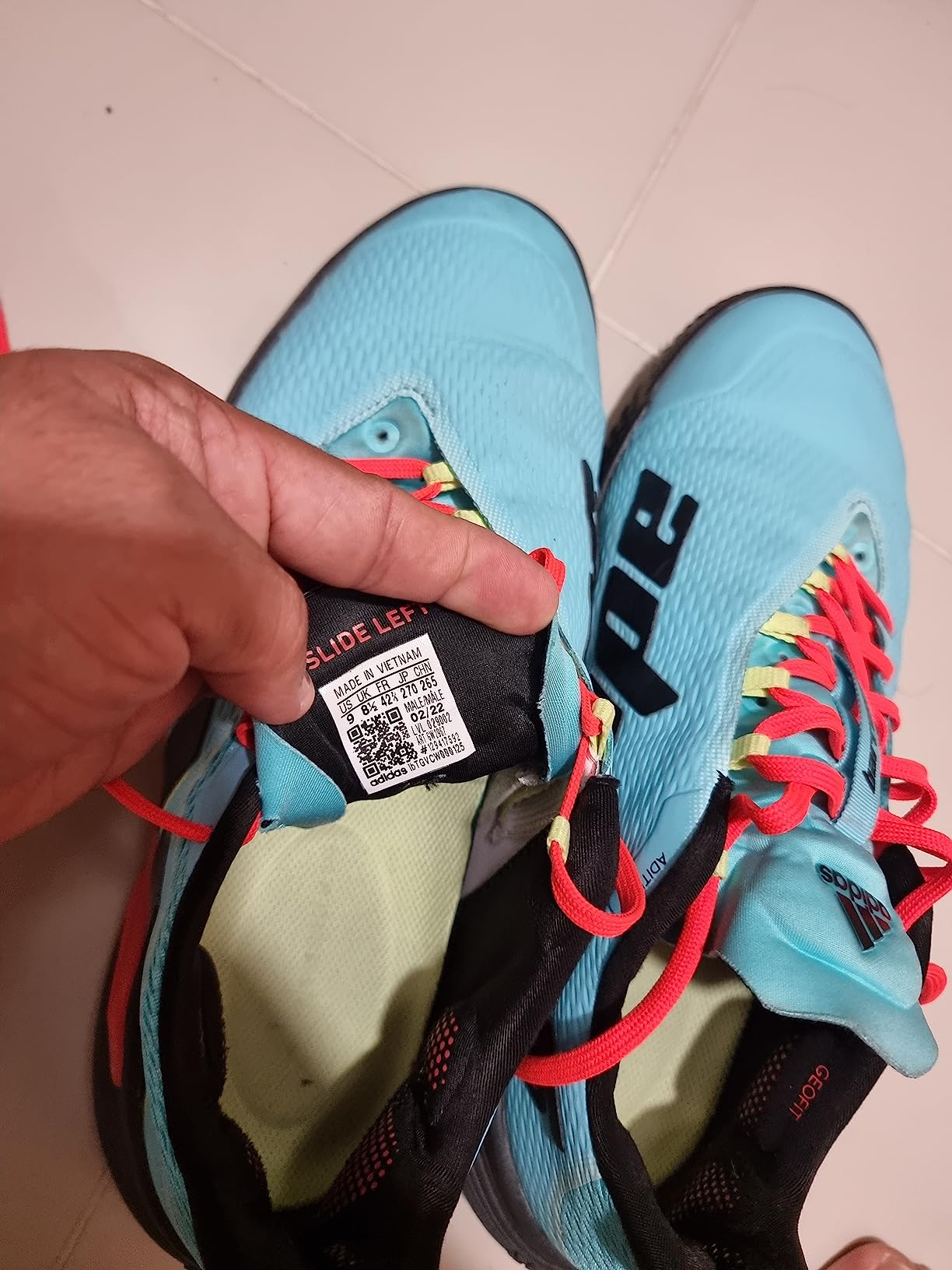Side profile of Adidas Barricade Clay showing overall design and proportions
