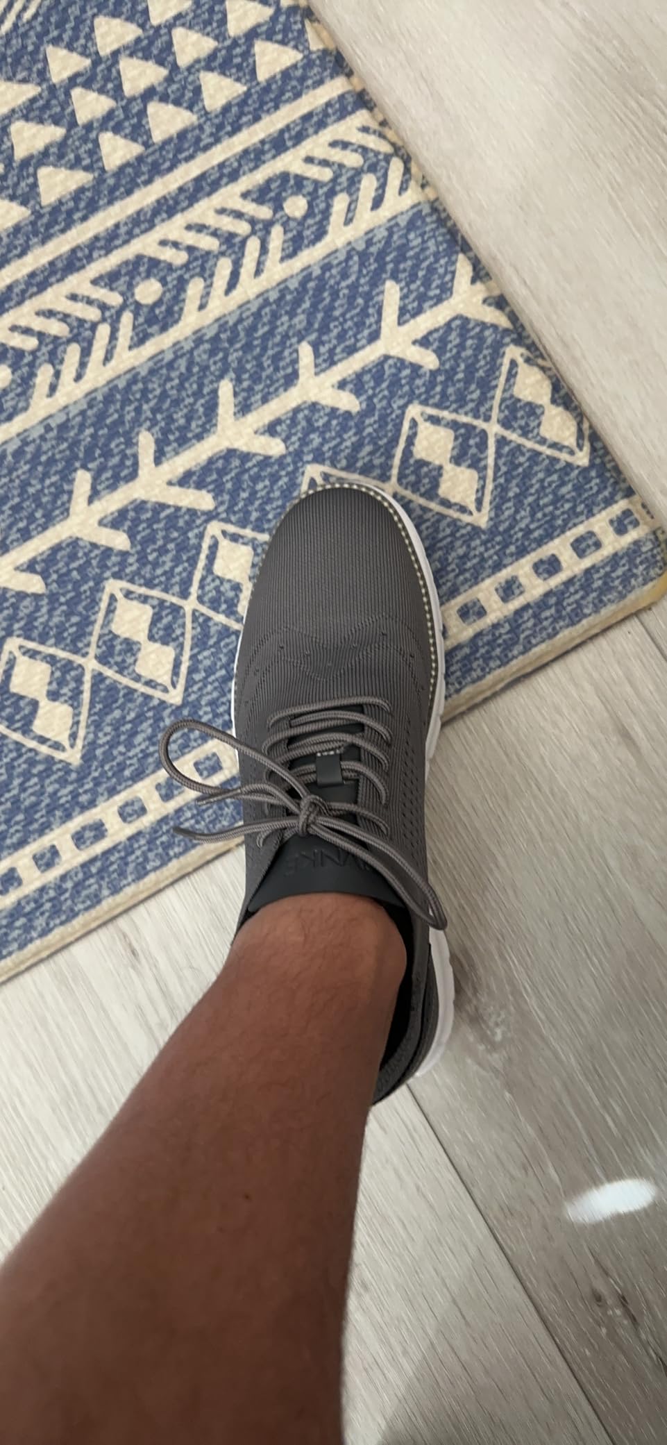 Bottom sole view of SVNKE shoes showing rubber traction pattern and wear patterns after testing
