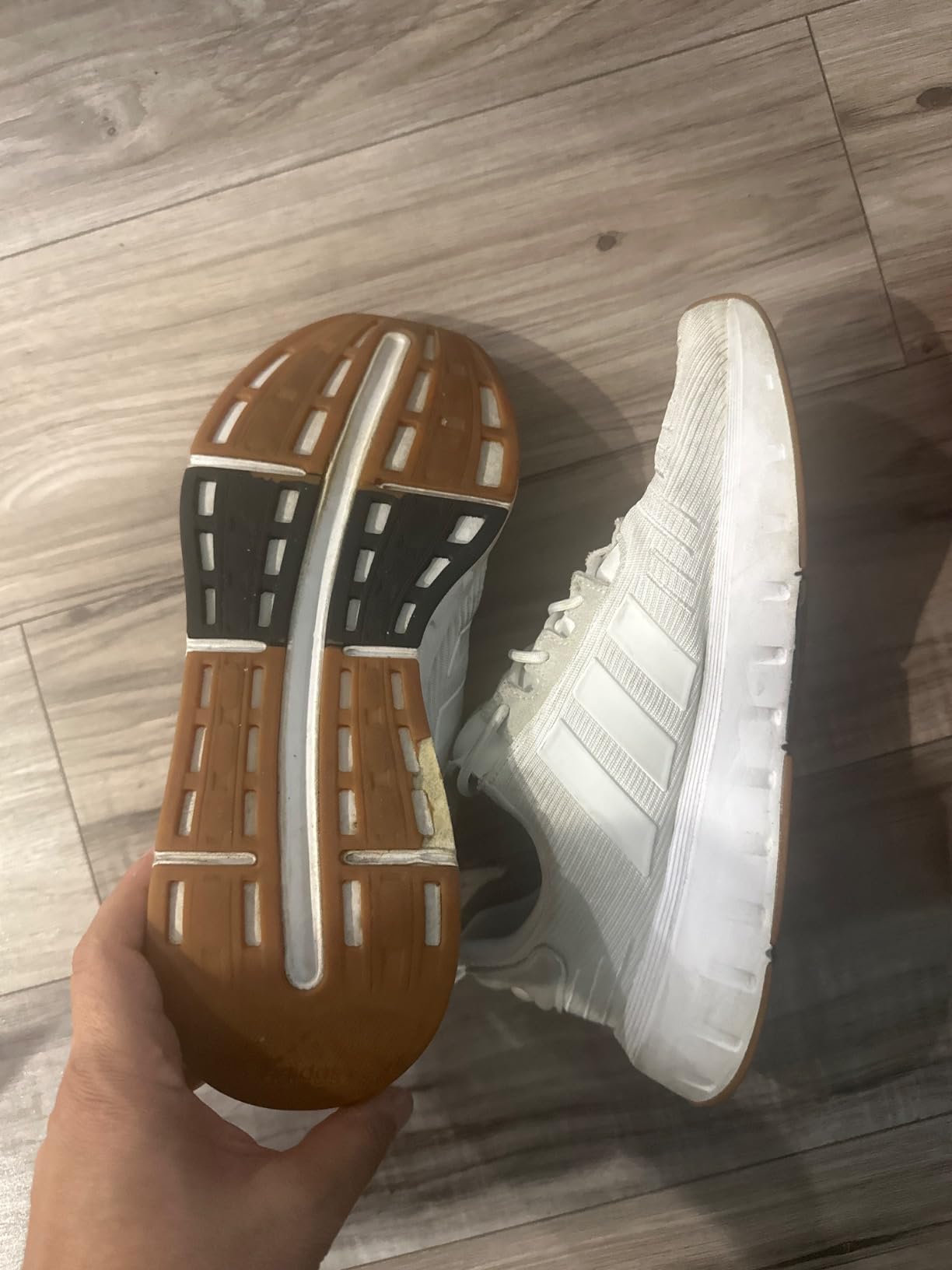 Adidas Swift Run showing sole separation issue after several weeks of use