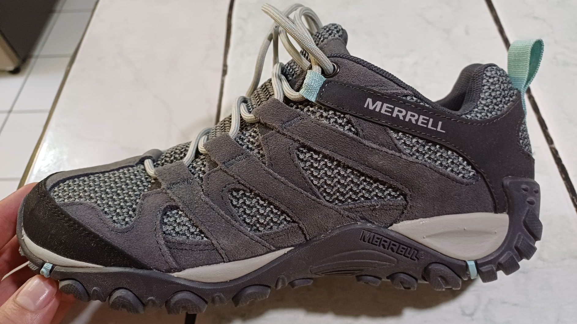 Close-up detail of Merrell Alverstone waterproof suede upper and mesh construction