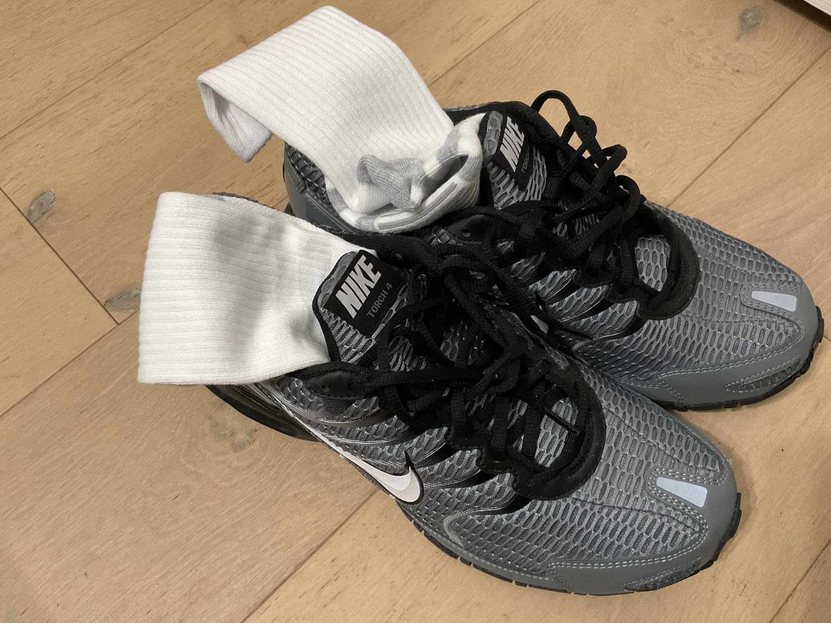 Nike Air Max Sequent 3 side profile showing plastic cage design and mesh upper construction