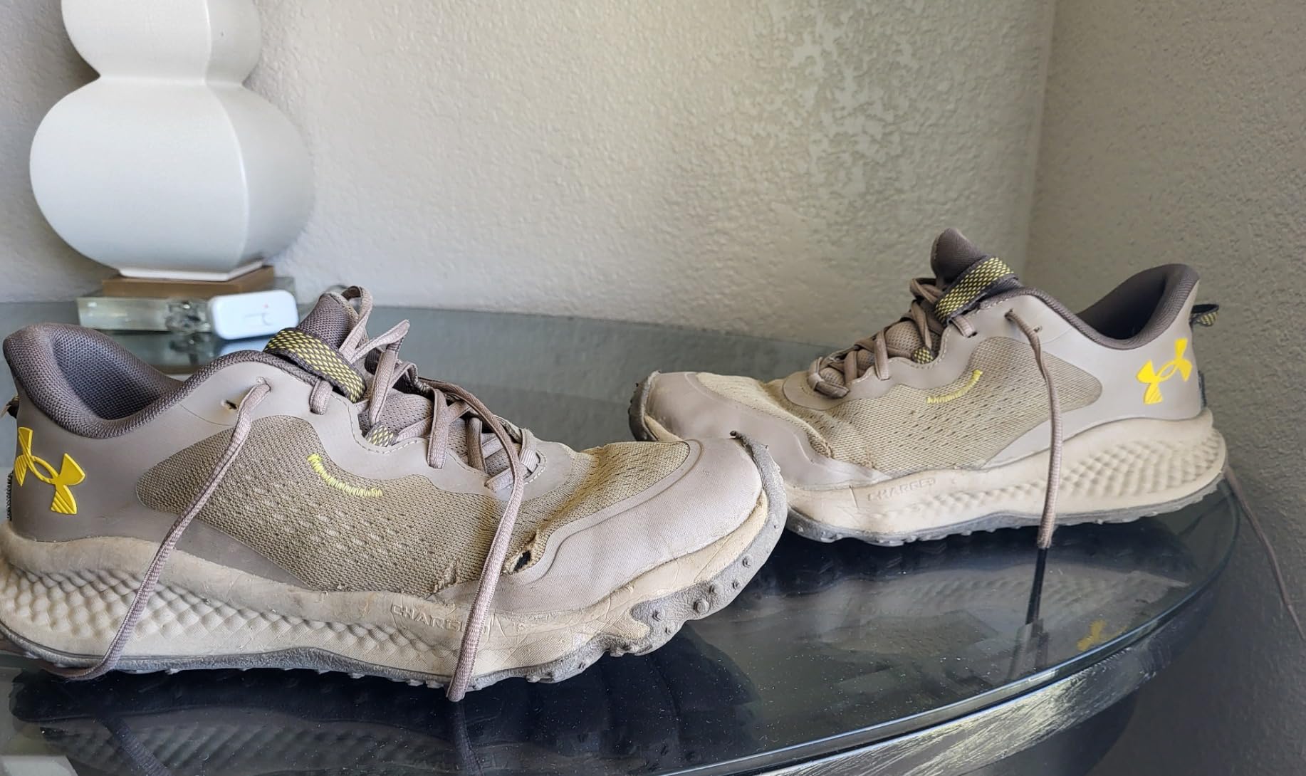 Under Armour Charged Maven trail shoe showing toe bumper protection and aggressive lugged outsole design