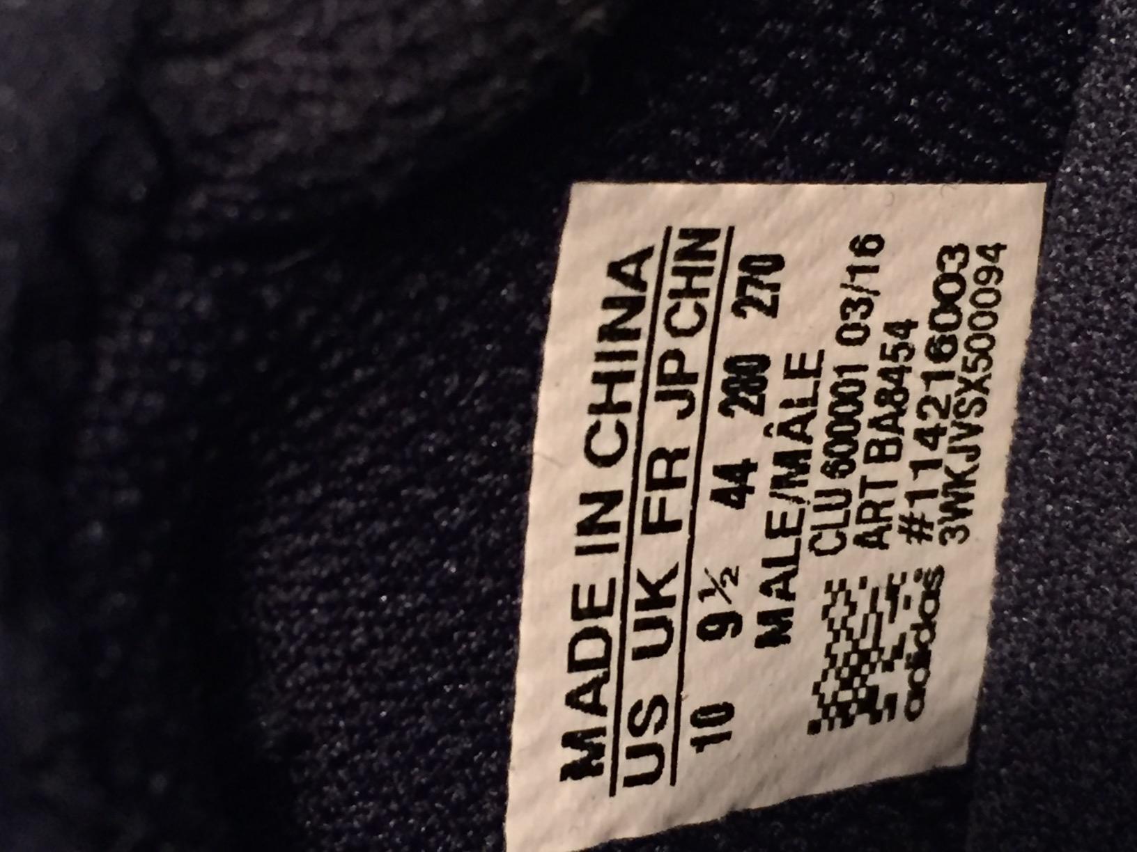 Adidas Pureboost ZG side profile showing attached tongue design and TPU heel stabilizers