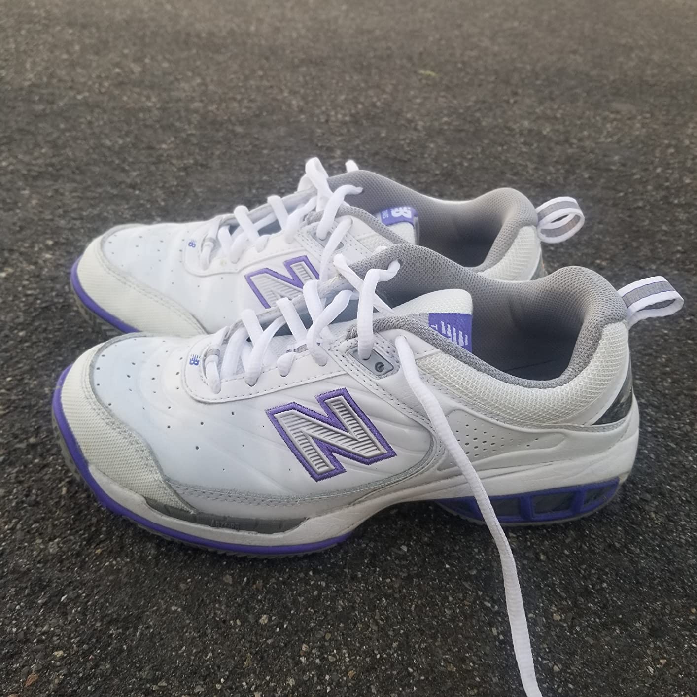 Comparison view of New Balance 806 tennis shoes showing overall construction quality