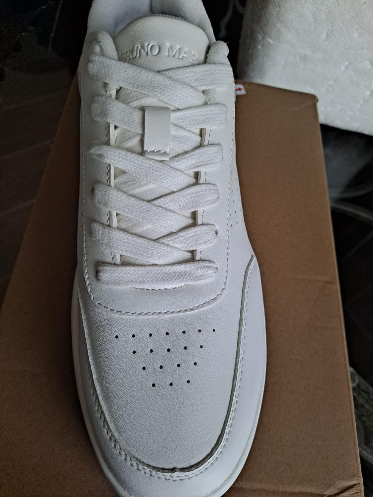 Interior view of Bruno Marc sneaker showing arch support insole and padded heel collar construction