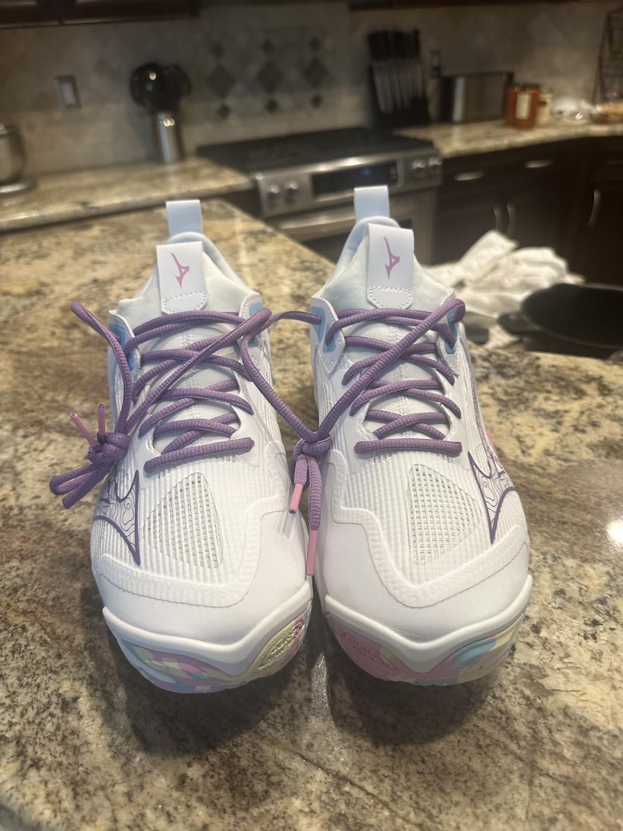Side view of Mizuno Wave Momentum 3 showing Wave technology and midsole construction
