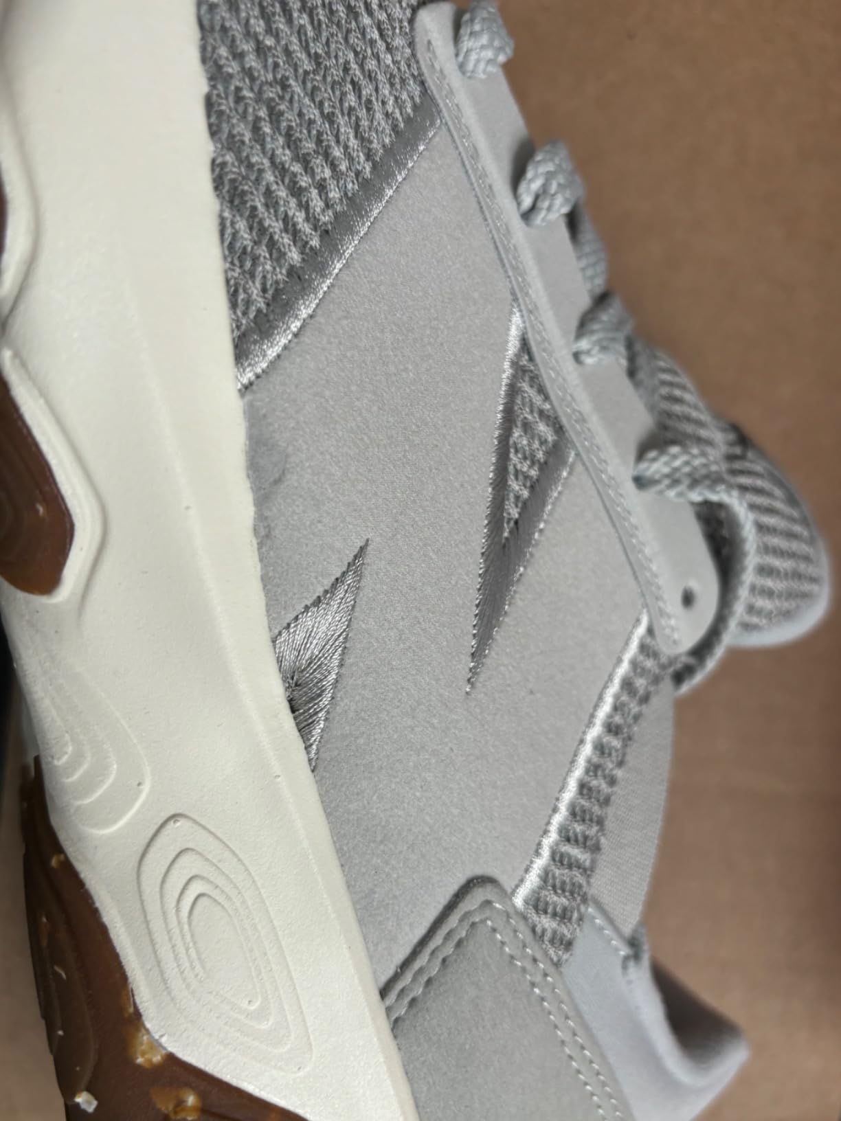 New Balance 1440 v1 showing construction quality and brand logo detail