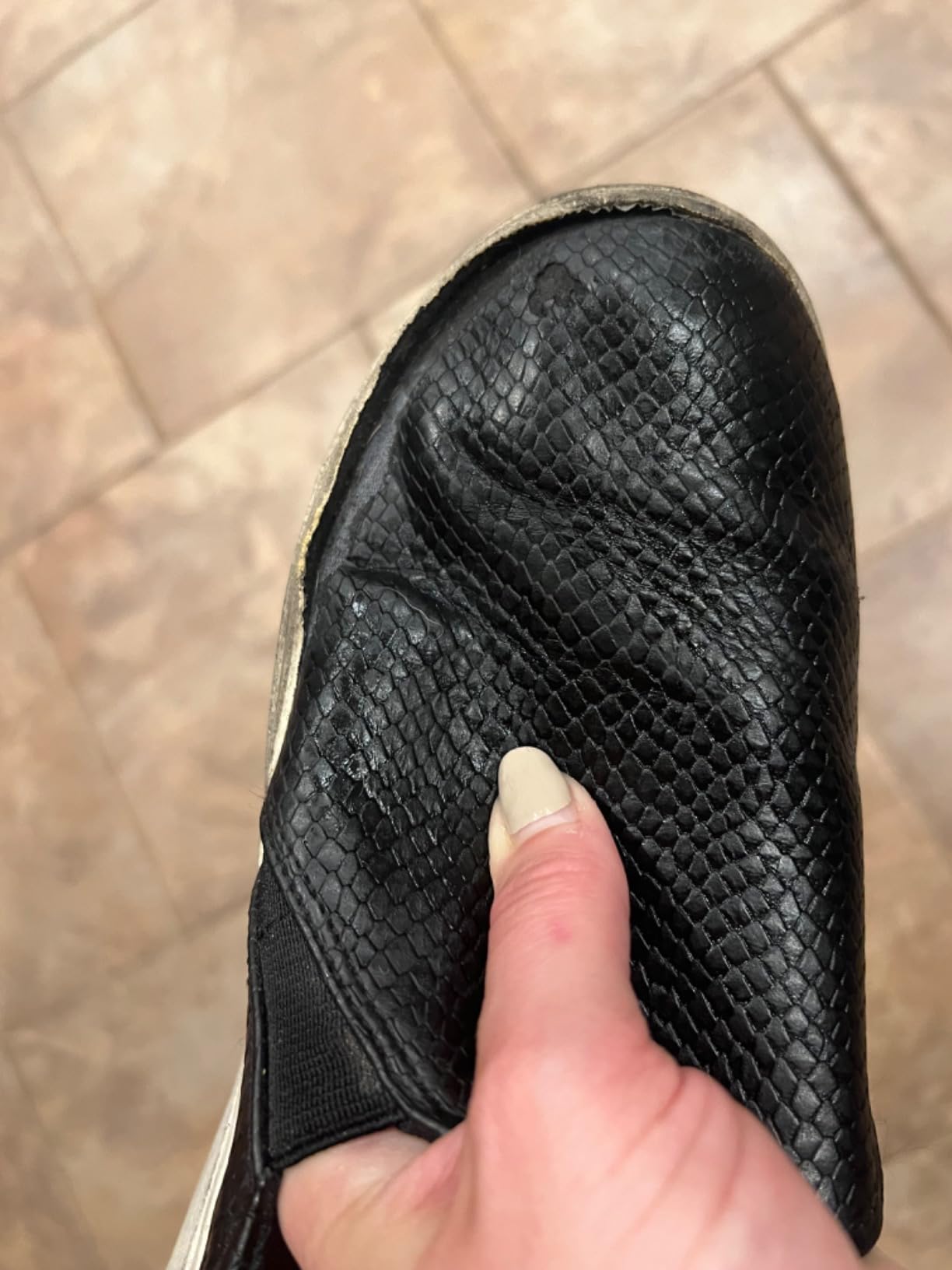Bottom view of Dr. Scholl's Nova showing sole separation and wear after 4 months of use