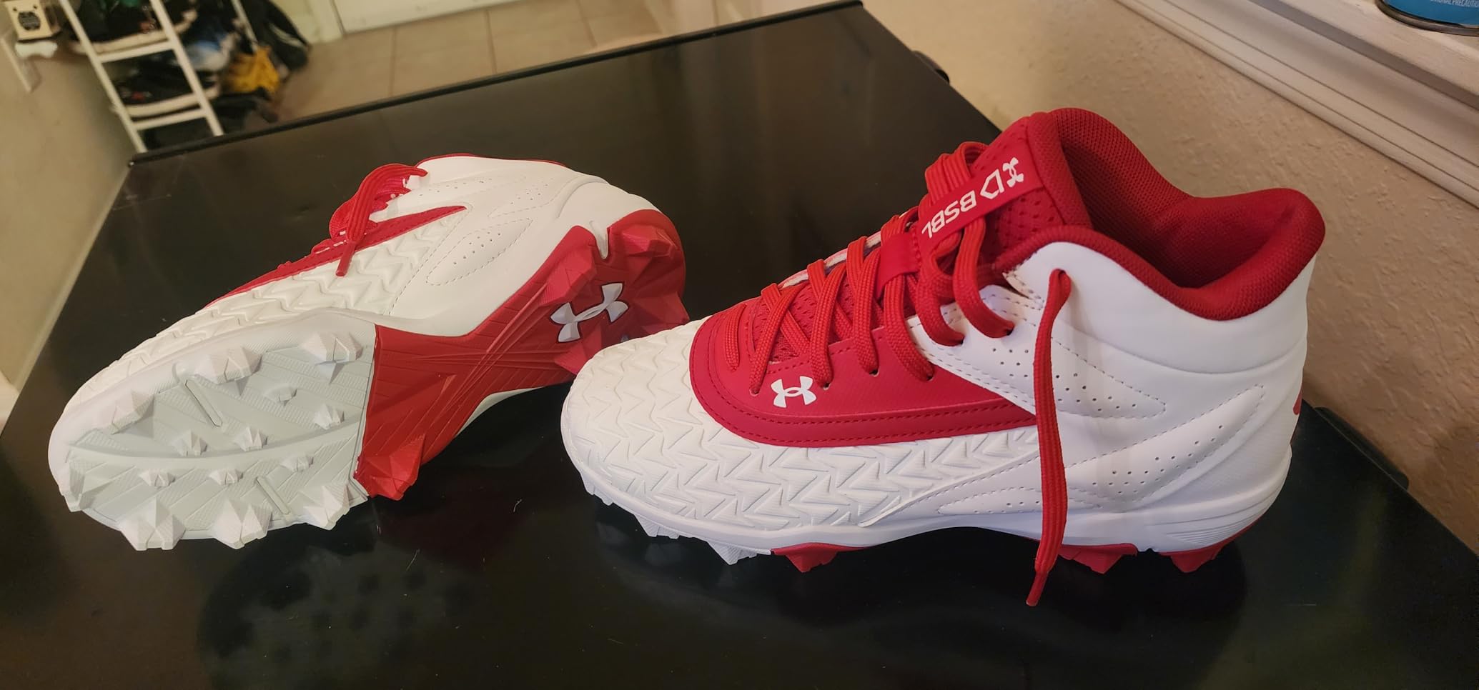 Under Armour Boys Leadoff Mid baseball cleats on field showing performance during youth baseball game action
