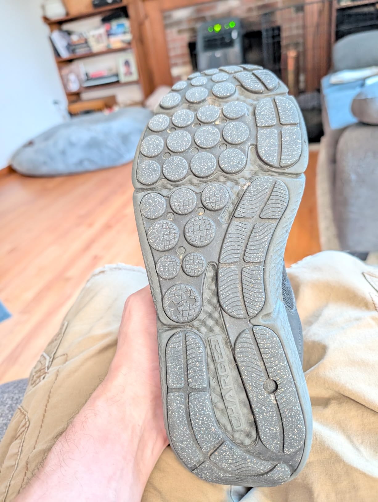 Under Armour Charged Assert 10 outsole pattern showing rubber coverage and traction design