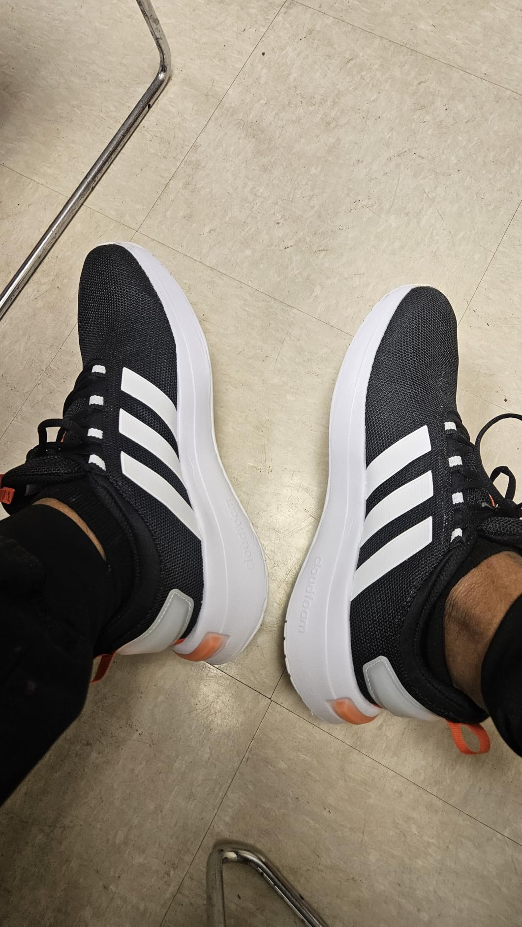 Side profile of Adidas Racer TR23 showing Cloudfoam midsole technology and overall silhouette design