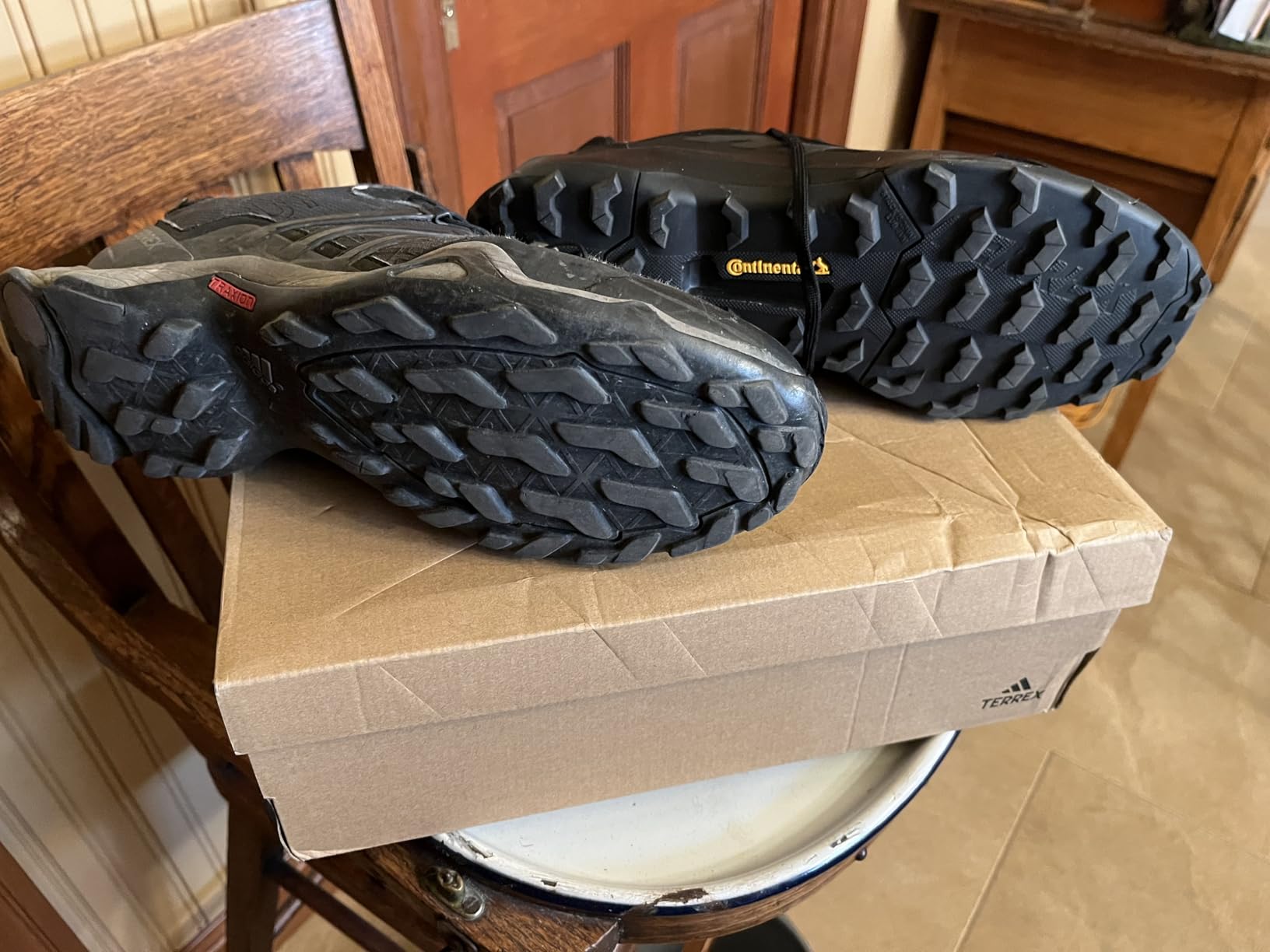 Comparison photo showing Adidas Terrex AX4 design details and construction quality