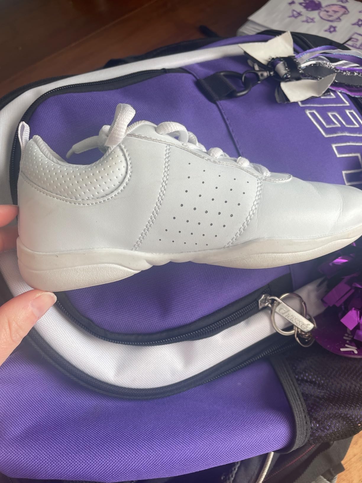 LANDHIKER cheer shoes sole design showing rubber grip pattern and spin pad for tumbling