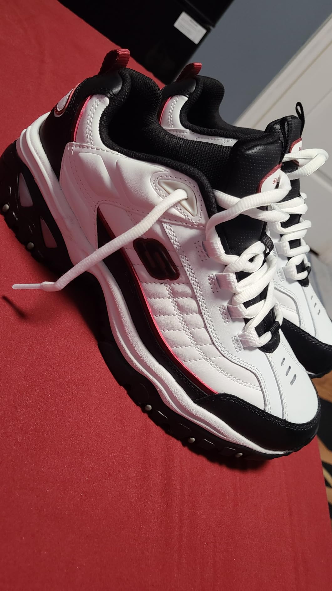 Skechers Energy Afterburn in workplace setting showing versatile design for professional environments