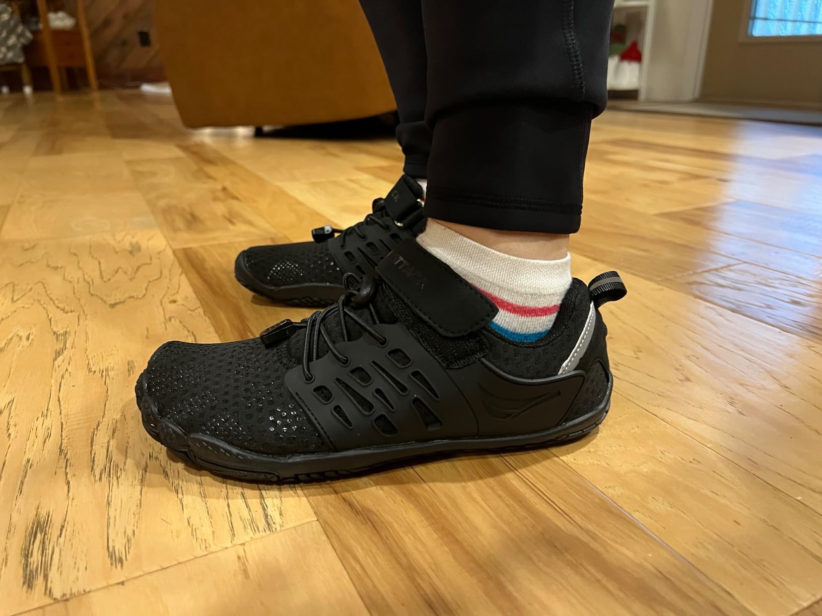 Grand Attack barefoot shoes showing flexible construction and velcro strap design