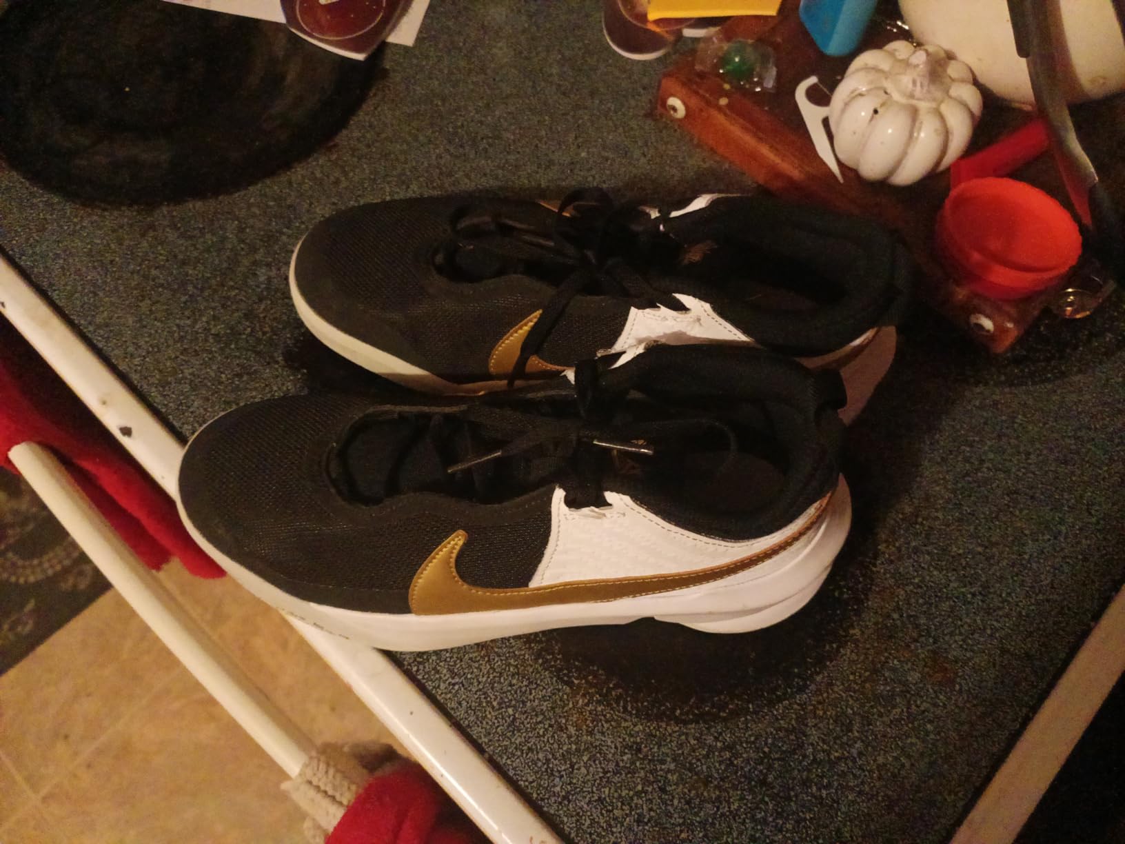 Bottom sole view of Nike Team Hustle D 10 showing traction pattern and rubber compound
