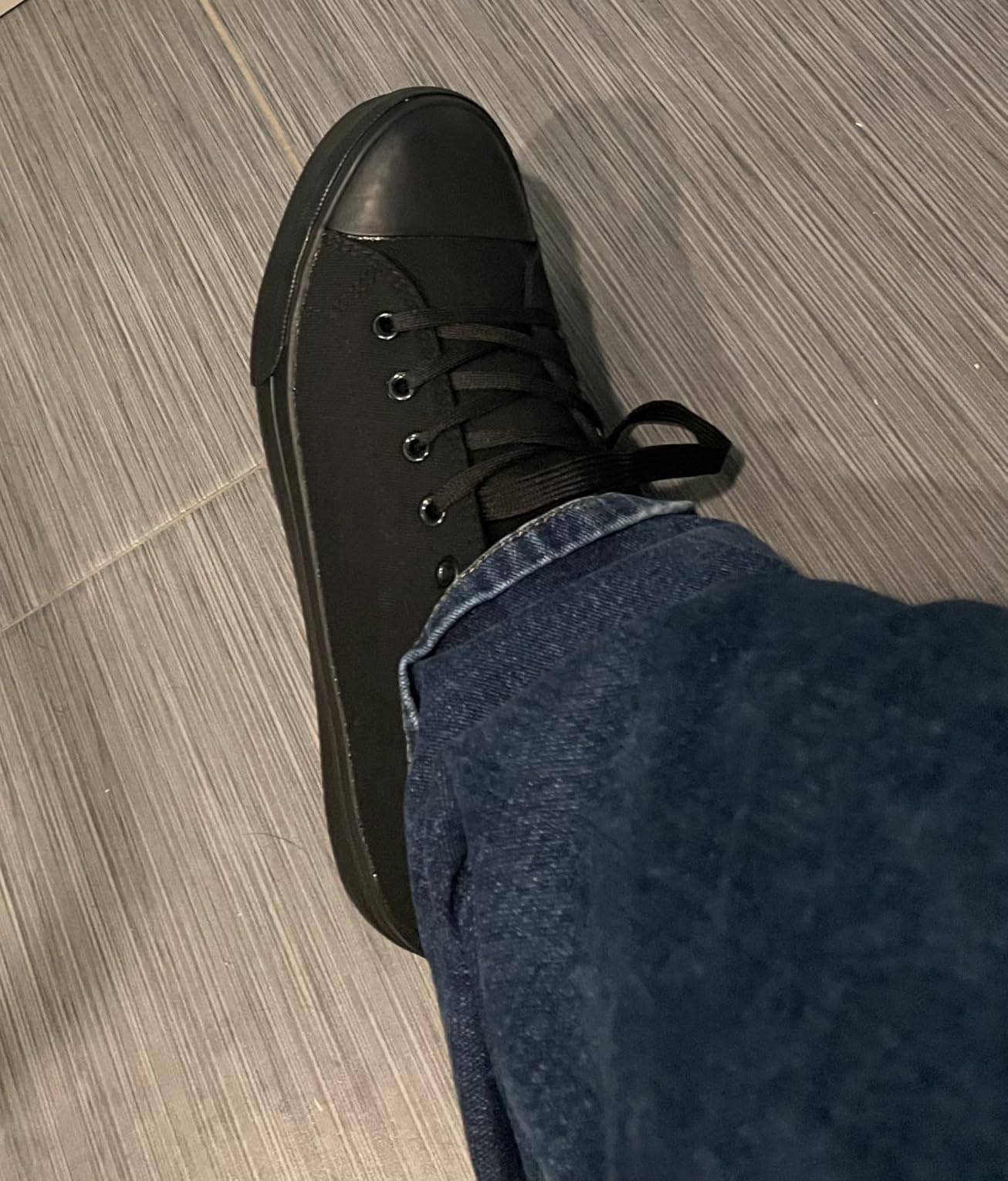 Close-up view of ZGR canvas shoes showing lacing system and padded collar detail