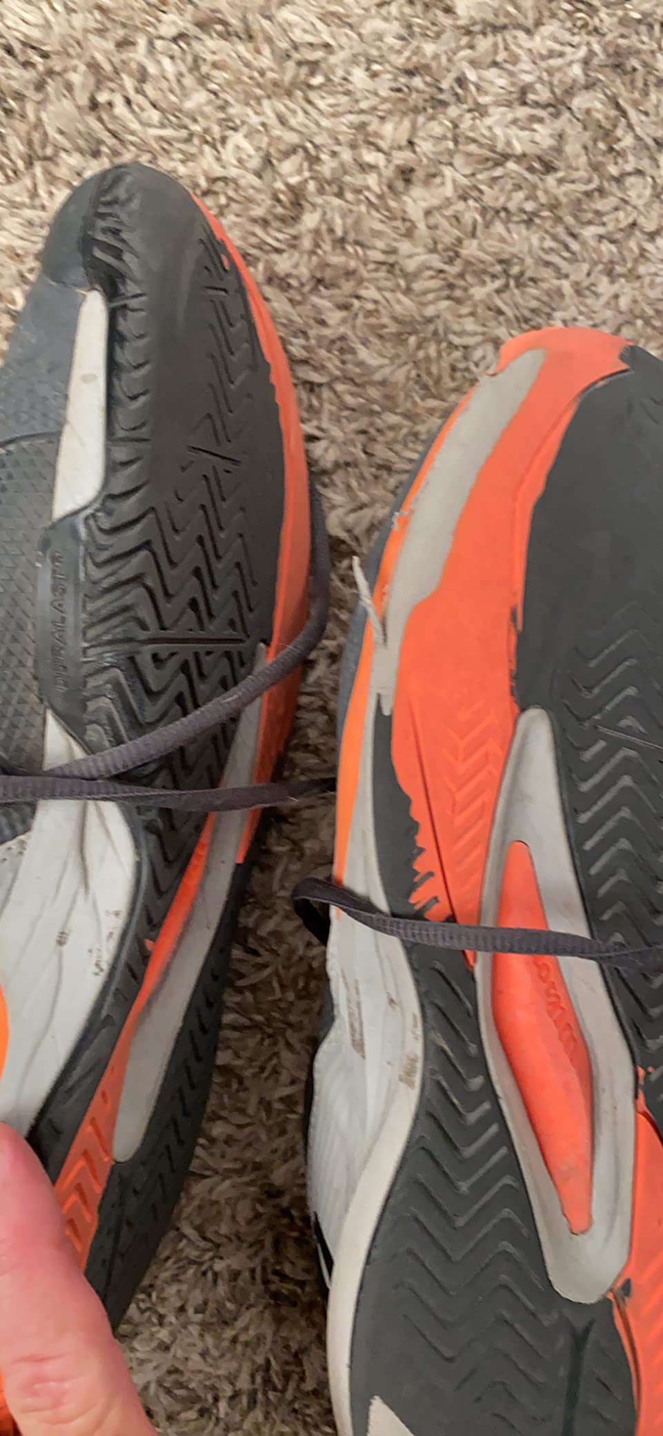 Wilson Rush Pro Ace tennis shoe outsole showing Duralast rubber compound traction pattern for court performance