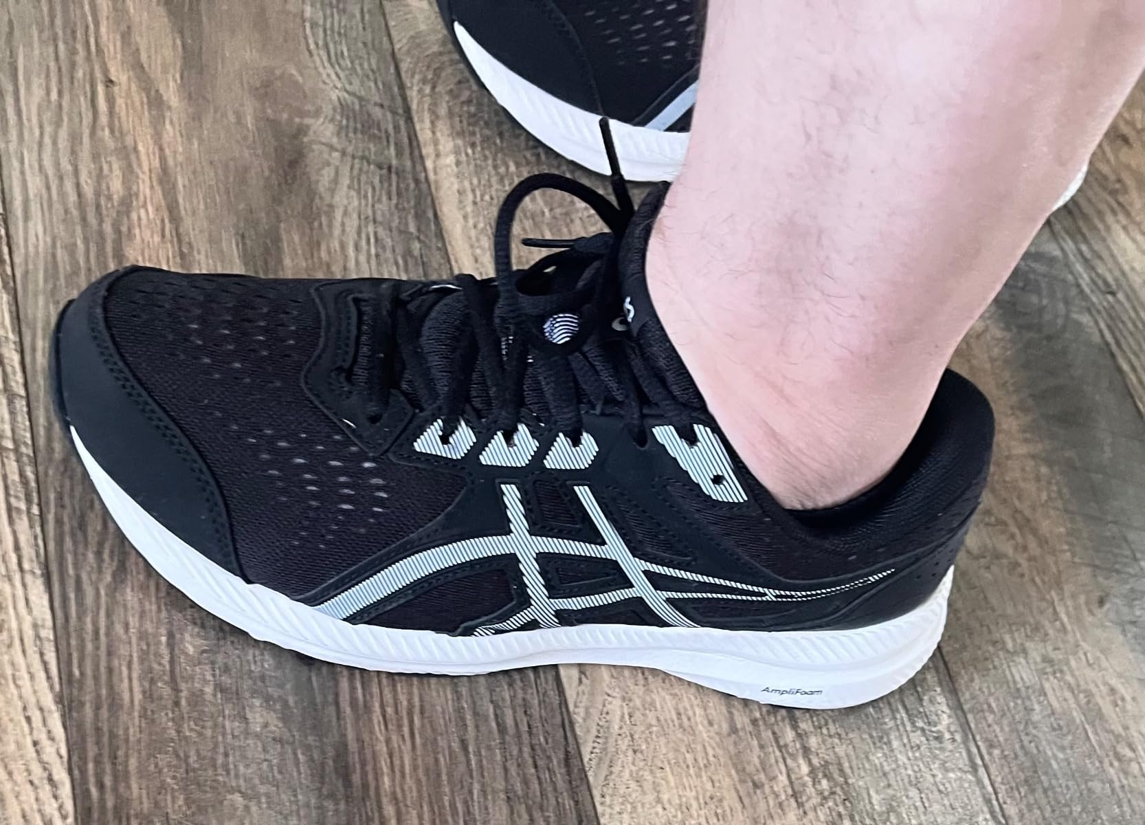 ASICS Gel-Contend 8 in real-world running condition showing wear patterns