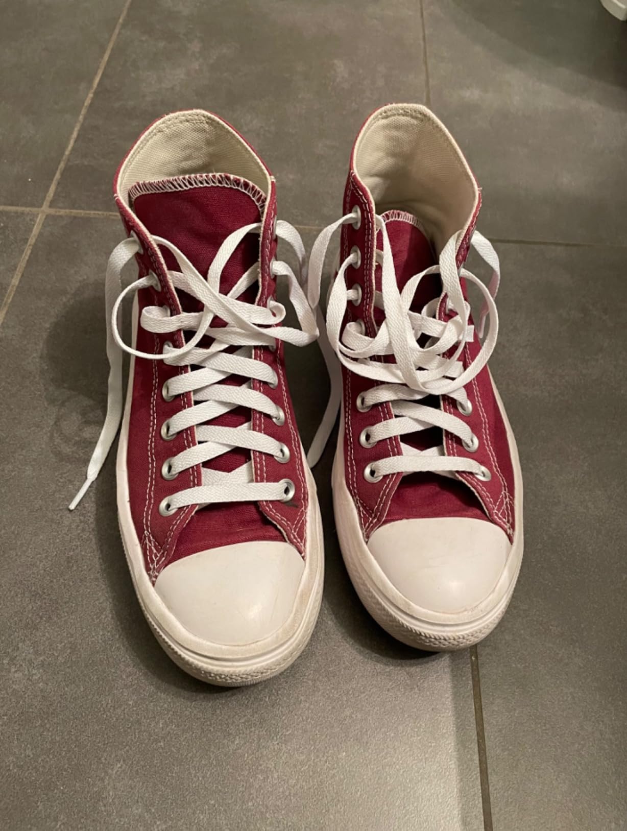 Multiple sneaker types showing UpUGo laces installed across different brands and styles