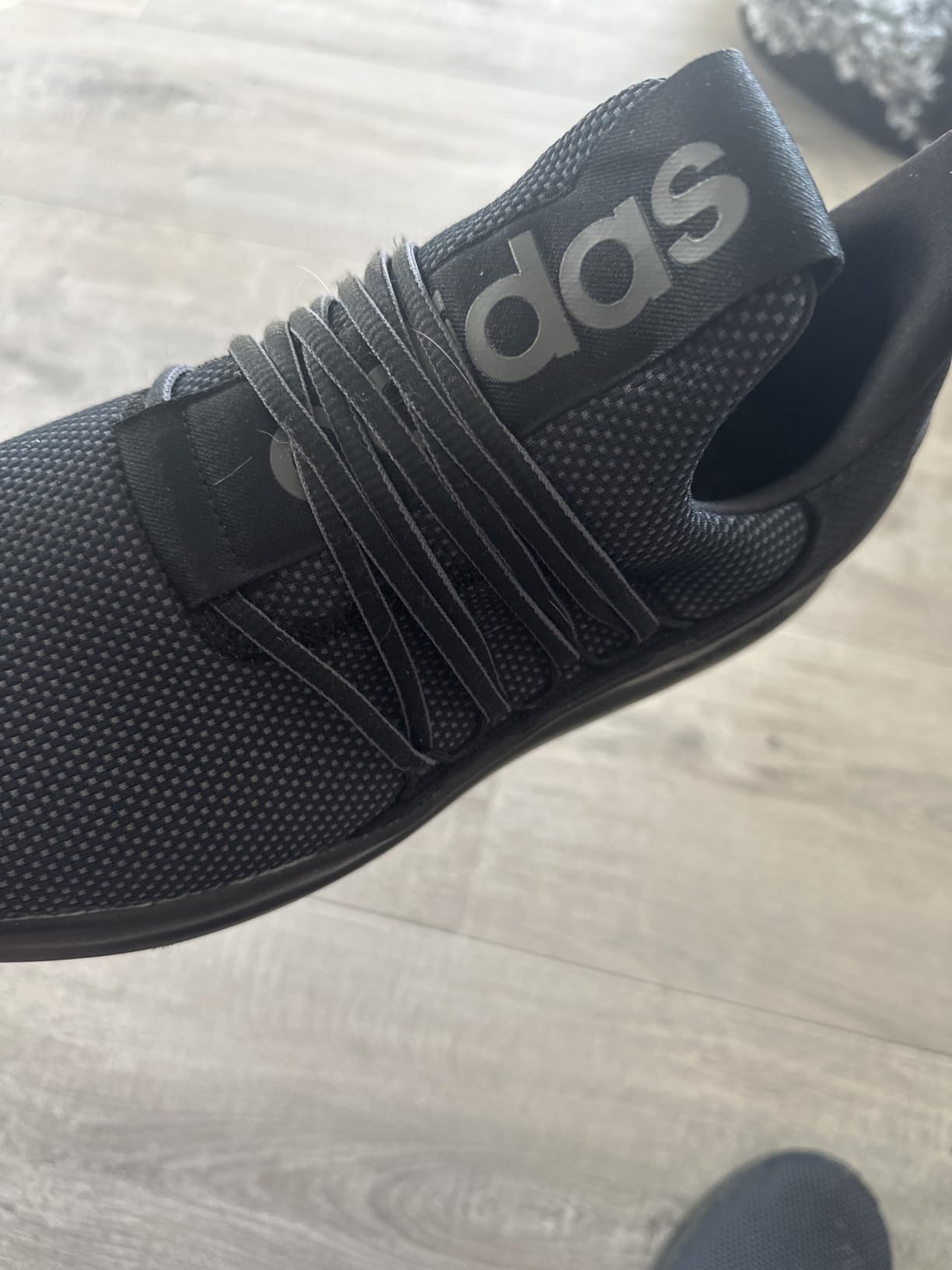 Adidas Lite Racer Adapt 7.0 during gym workout showing performance on gym floor