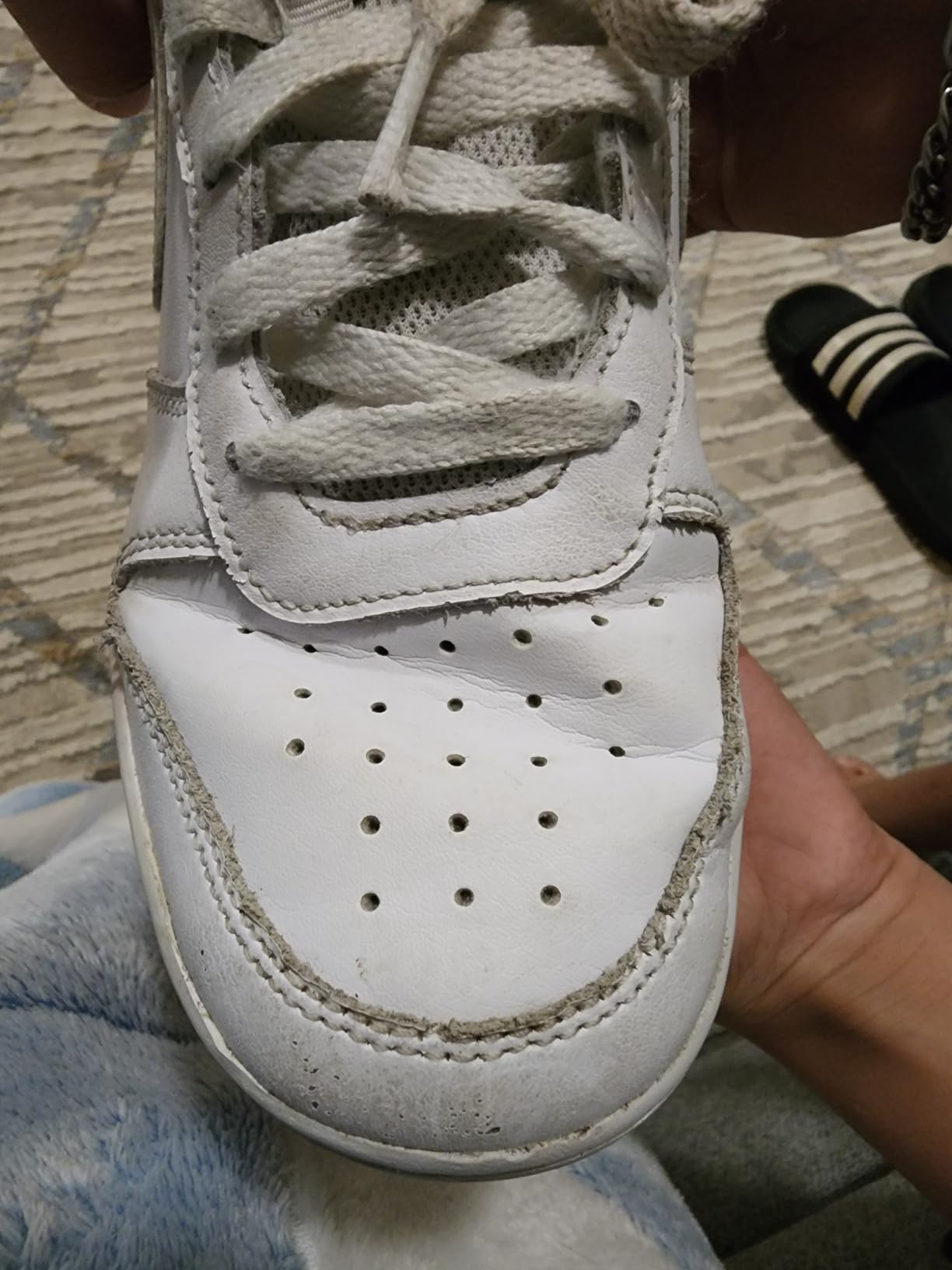 Nike branding and recycled material construction details on Court Borough Low Recraft
