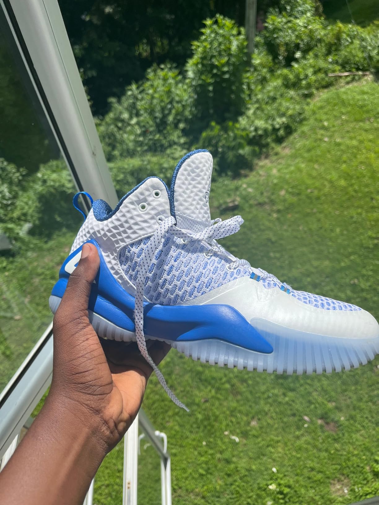 PEAK Streetball Master side view showing ankle support design and heel construction