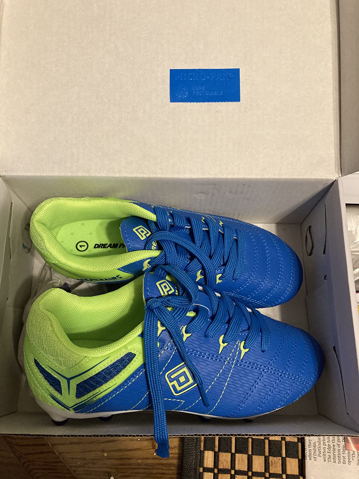 Multiple DREAM PAIRS soccer cleats showing popular colorways chosen by youth players