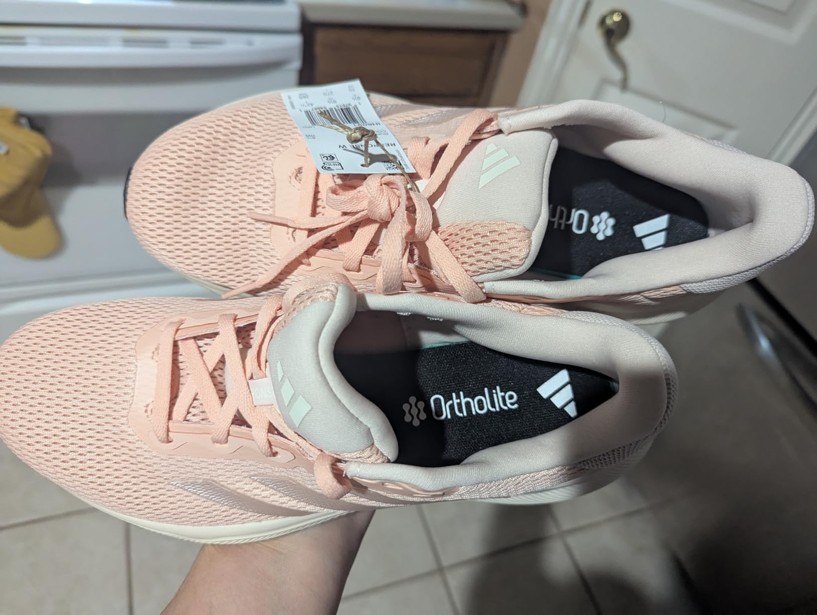 Marketing claims verification showing Adidas Women's Response shoe features and performance