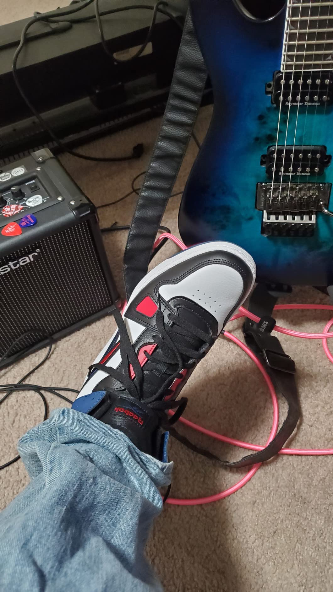 Reebok Resonator Mid basketball shoes black colorway showing retro design and high ankle support