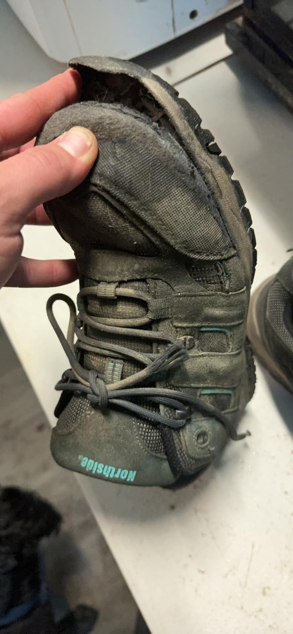Close-up view of Northside Monroe hiking shoe showing suede upper construction and protective toe cap design