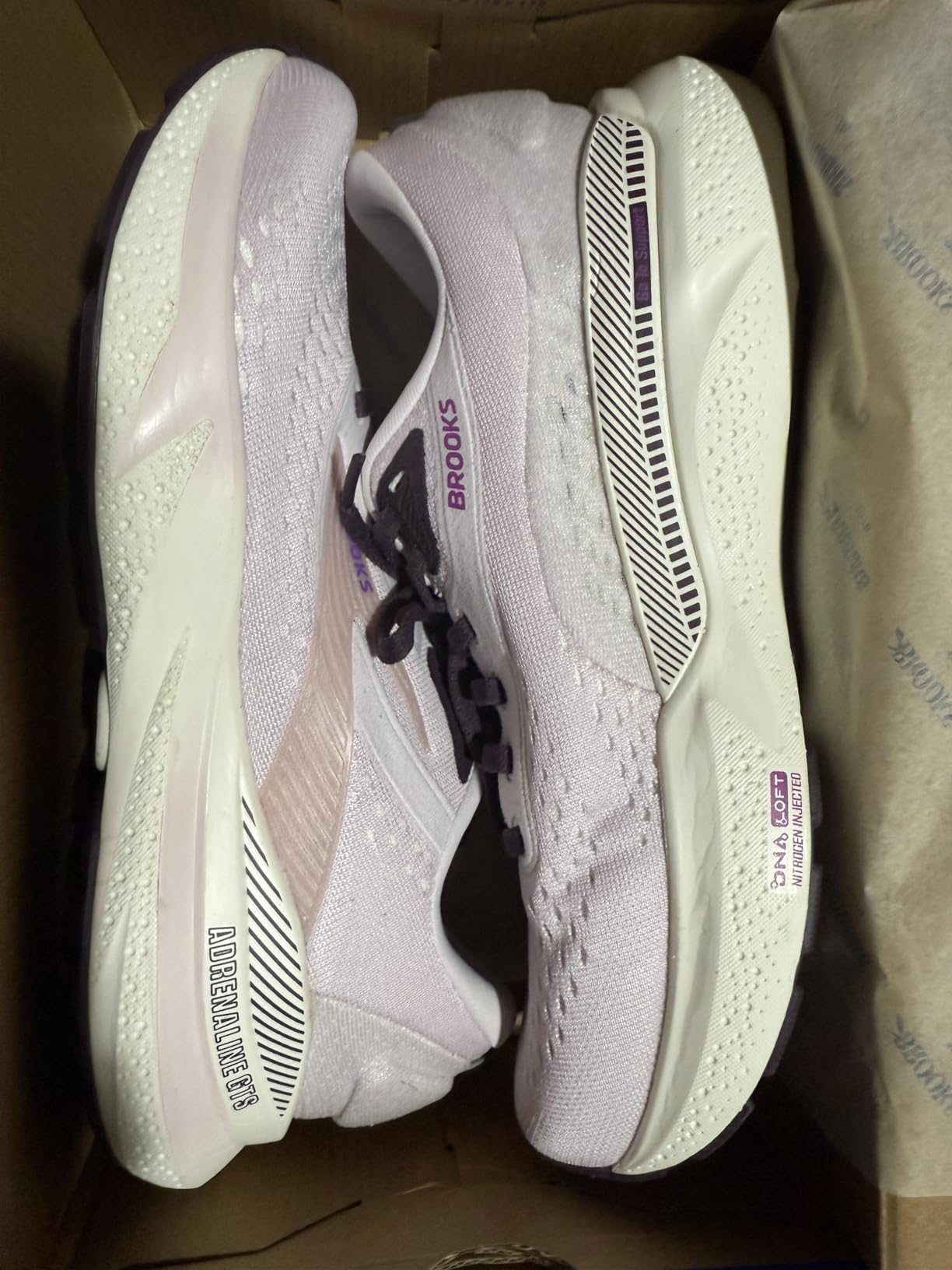 Brooks Adrenaline GTS 24 women's running shoe in action showing performance during daily activities