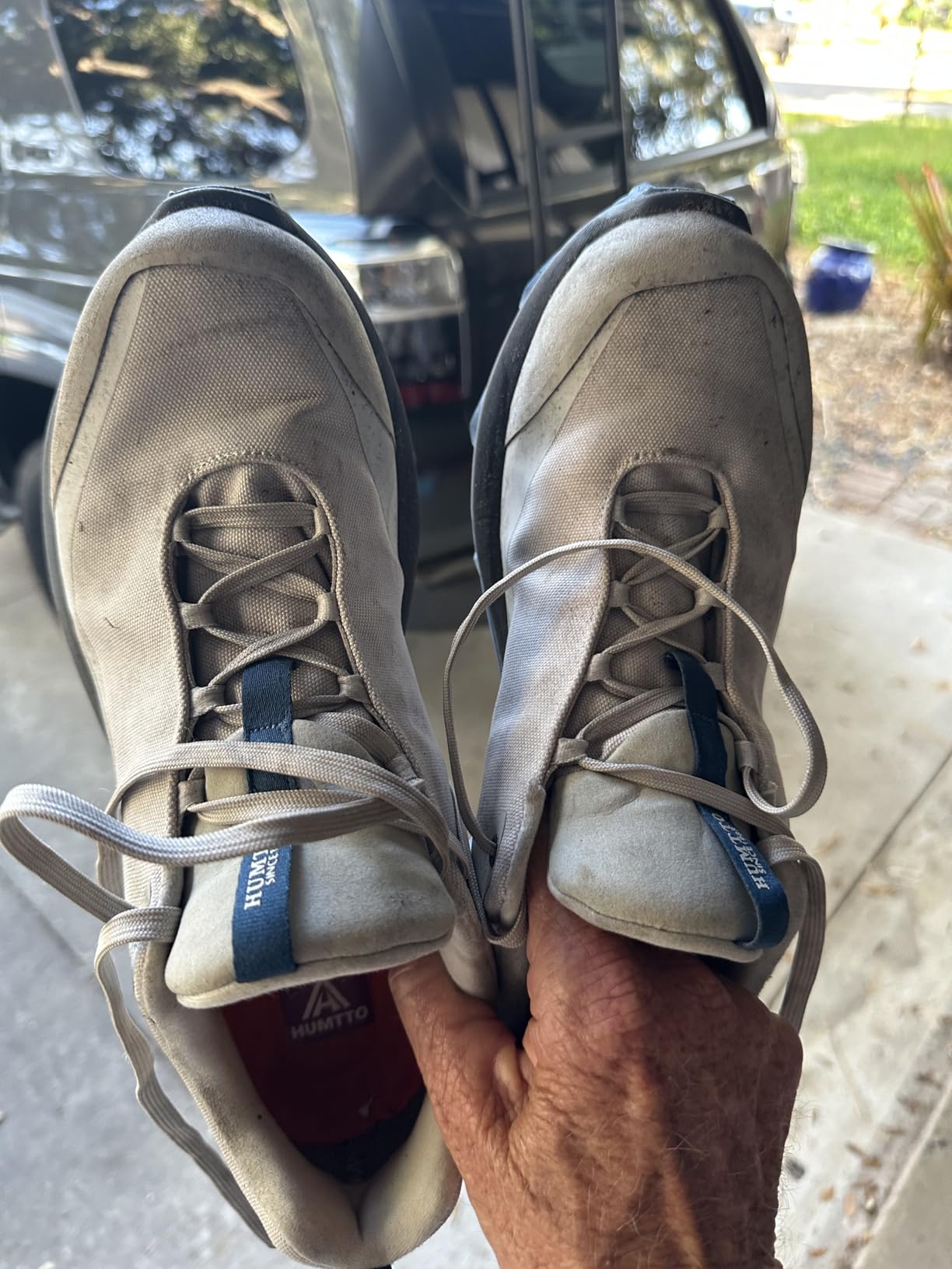 HUMTTO shoes in action on outdoor terrain showing traction performance