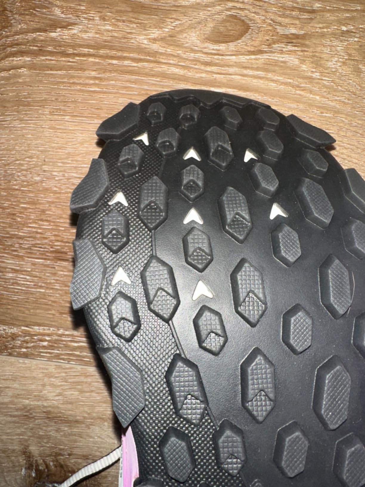 Columbia AdaptTrax outsole showing aggressive lug pattern for trail traction