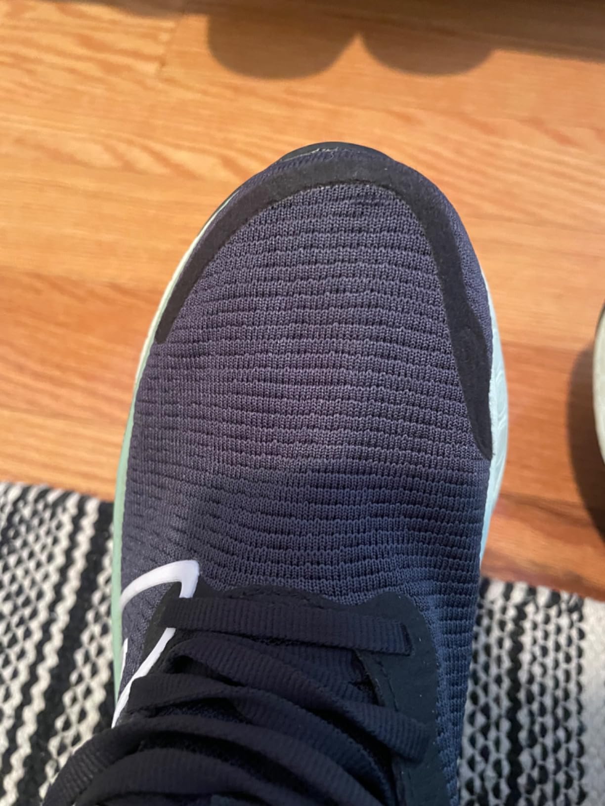 Another angle showing wear patterns and mesh construction detail with visible stress points