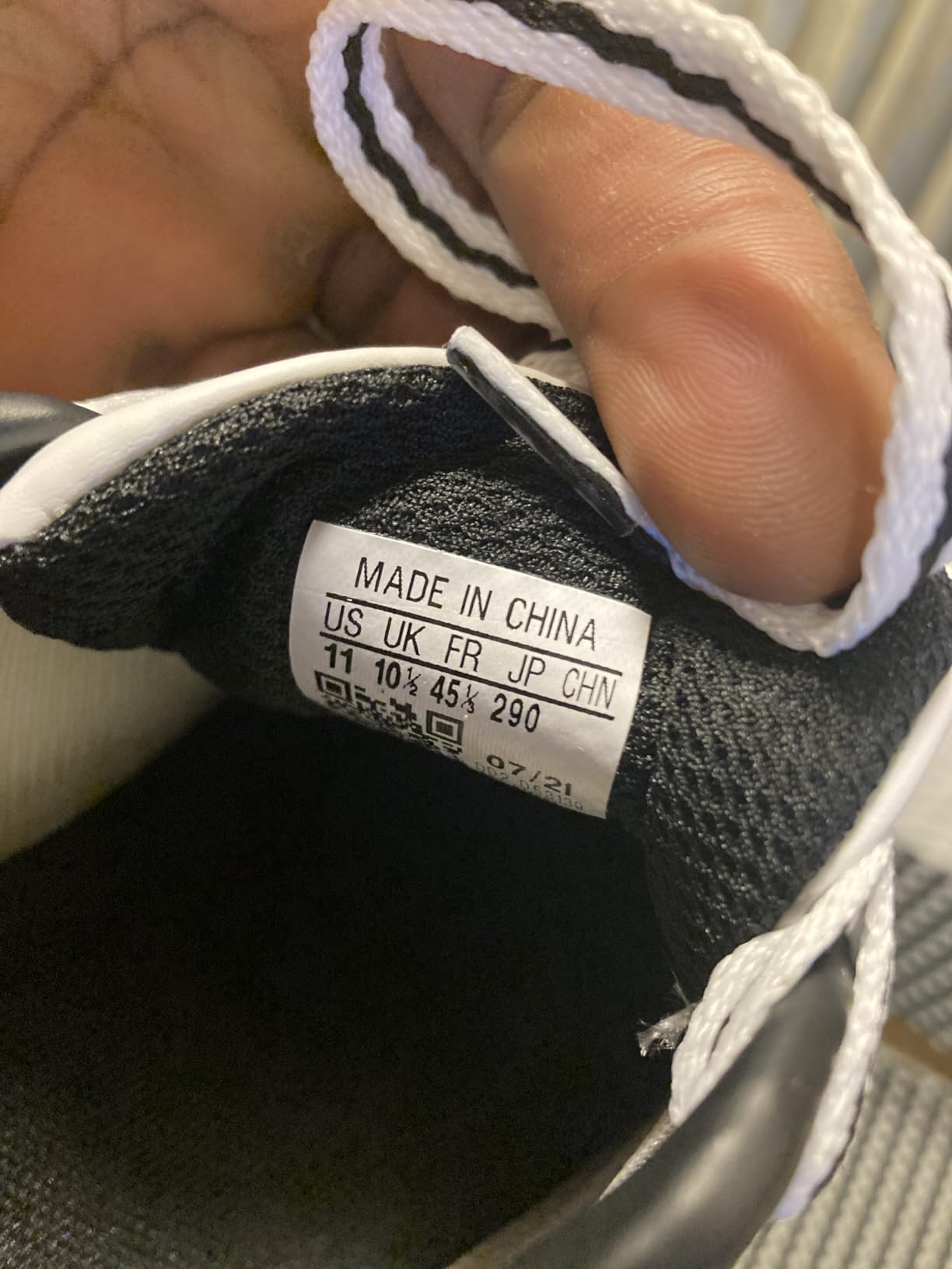 Close-up view of Adidas Adi-Kick sole showing rubber grip pattern and pivot points for martial arts