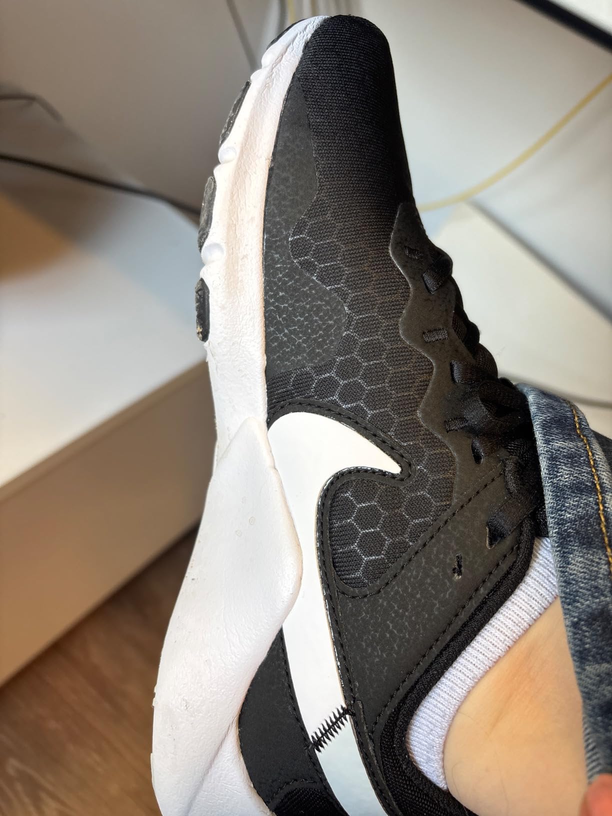 Nike women's training shoes in gym environment showing versatility for multiple workout types